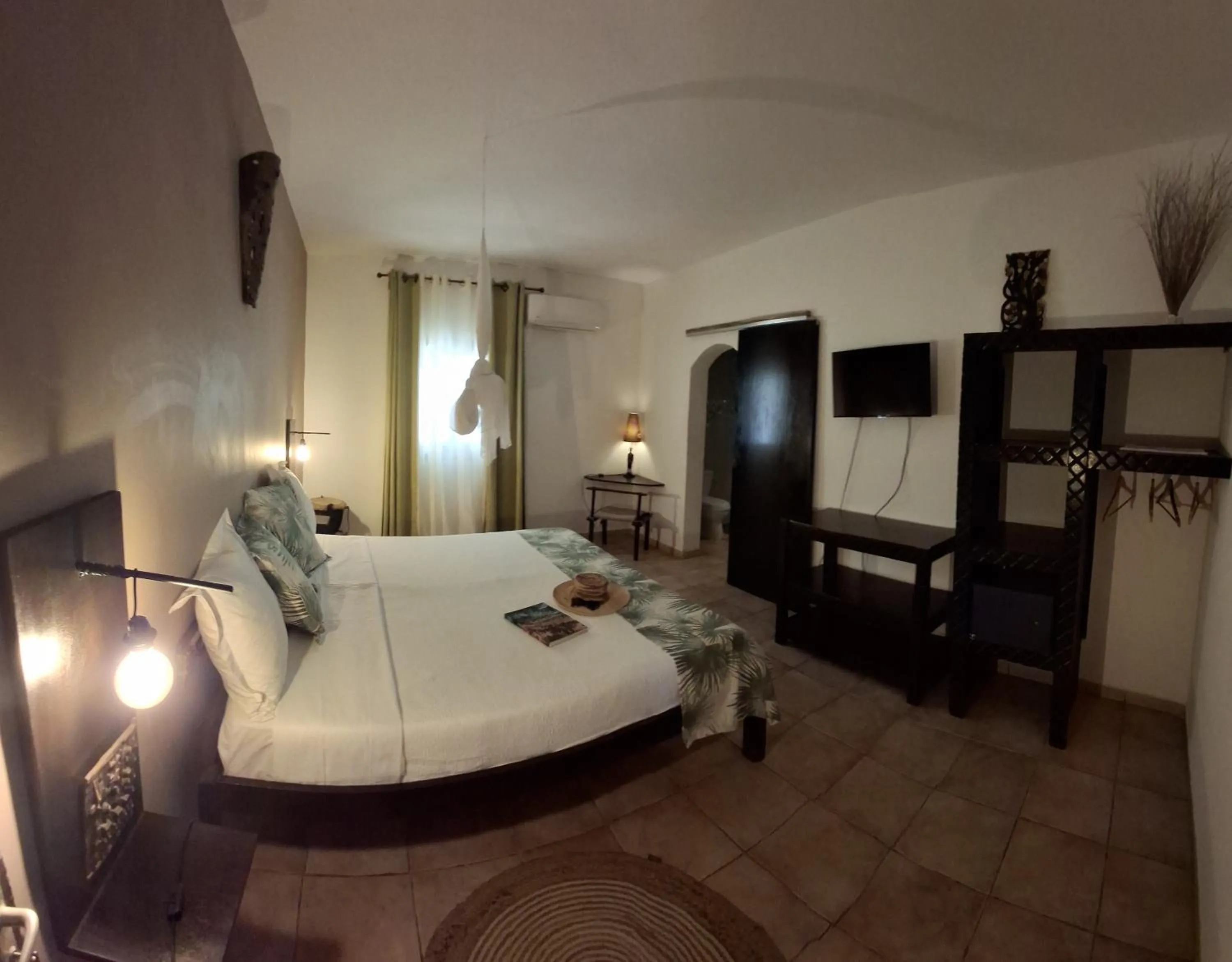 Bed in La Maison Abaka