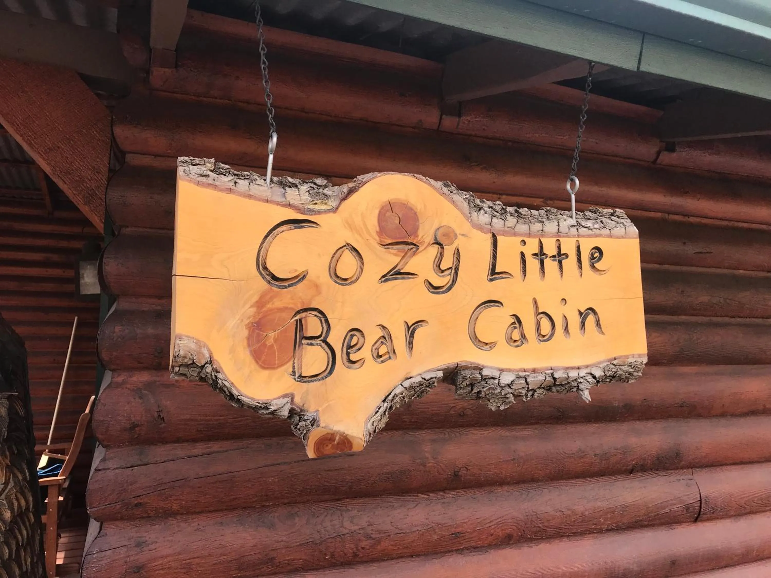 Property logo or sign in Gonzales Cozy Little Bear Cabin
