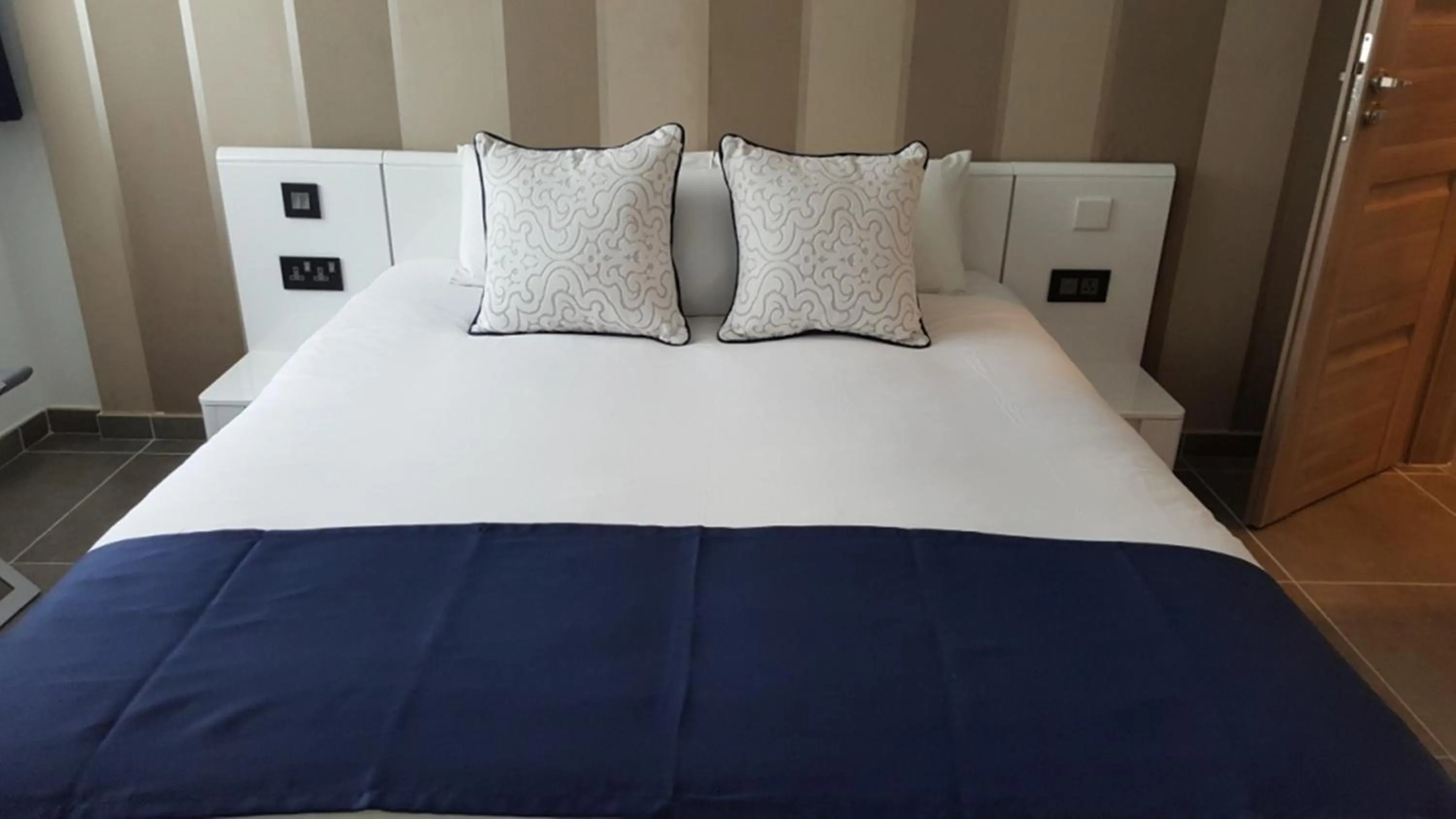 Bedroom in Pebbles Boutique Aparthotel