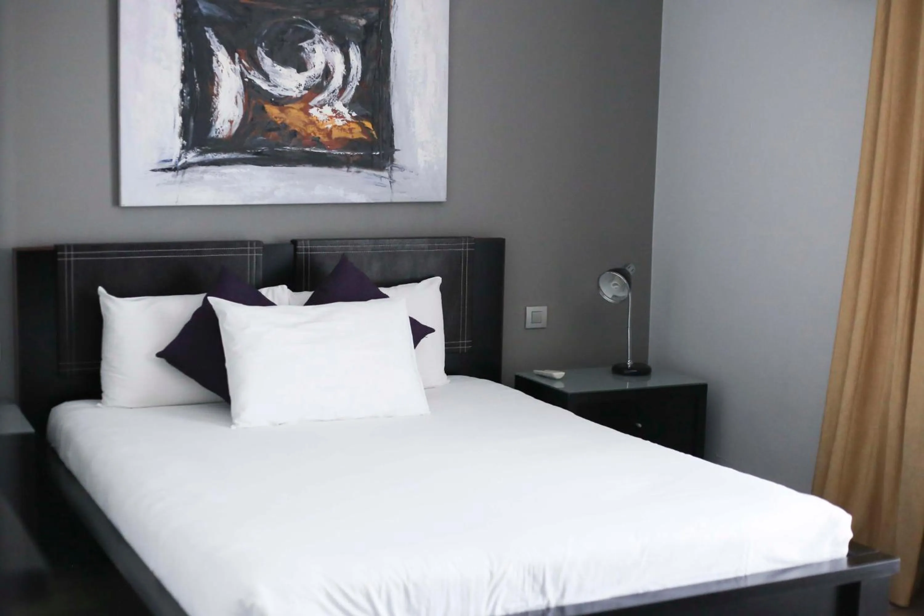 Bedroom in Pebbles Boutique Aparthotel