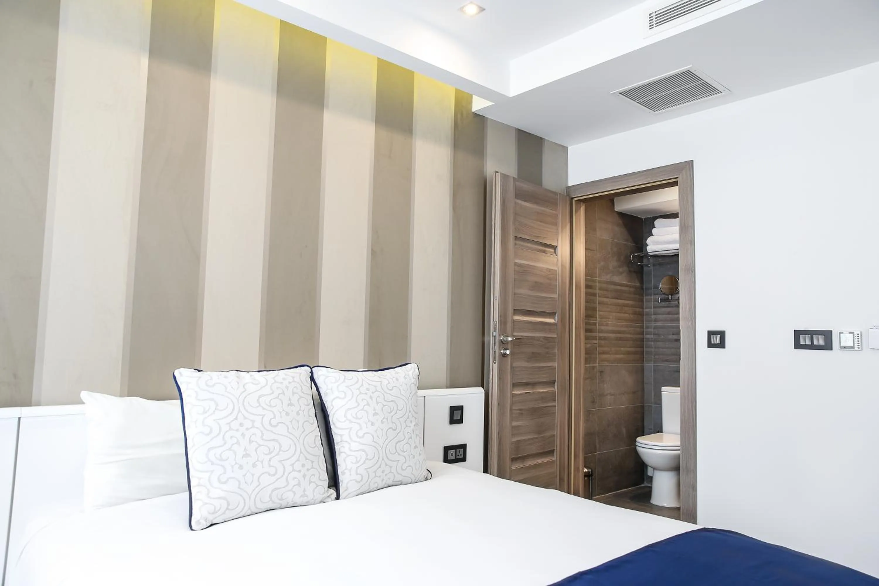 Bedroom in Pebbles Boutique Aparthotel