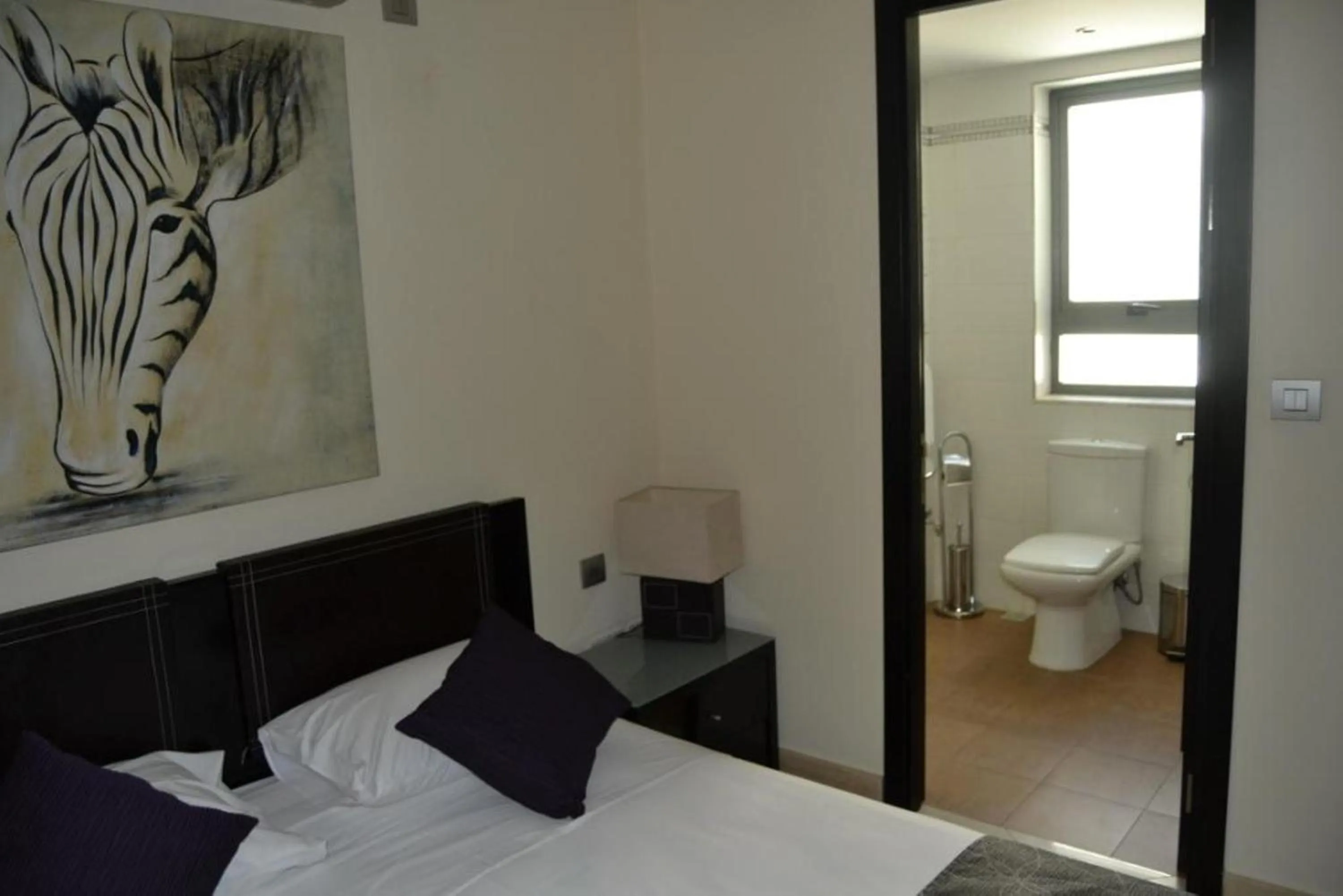 Bedroom in Pebbles Boutique Aparthotel