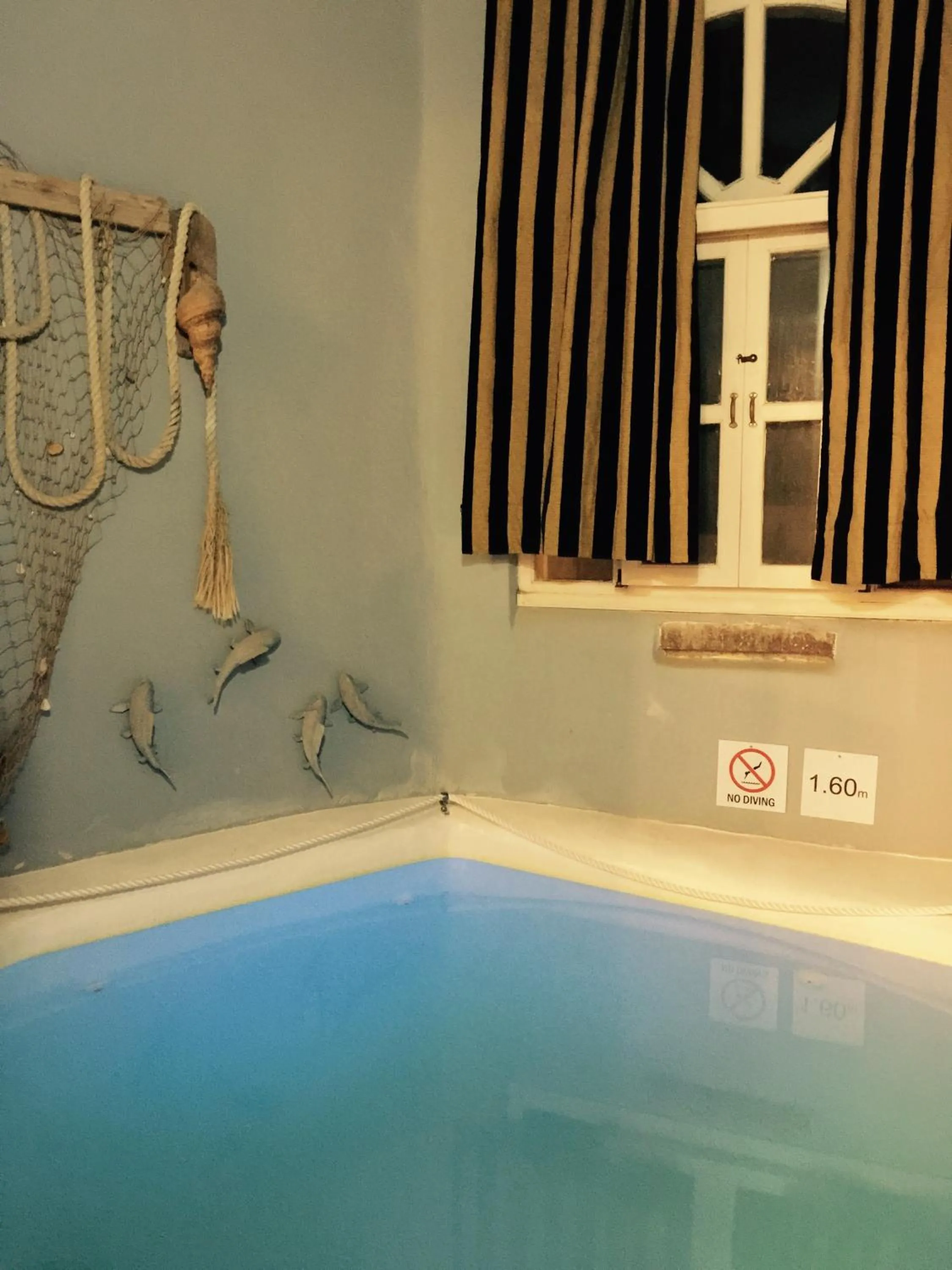 Swimming pool in Timedrops Santorini Villas