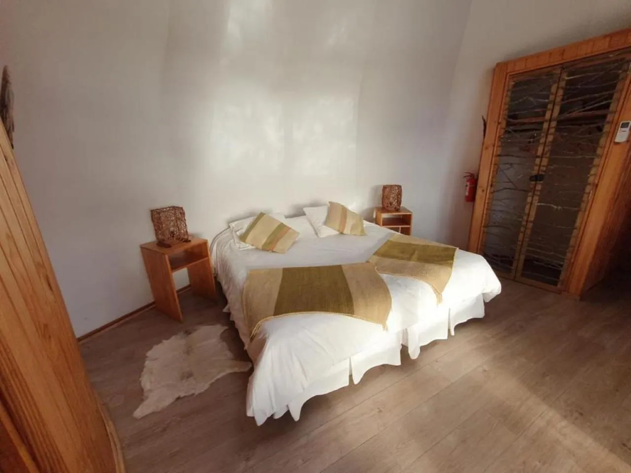 Decorative detail, Bed in Magma Lodge, Pucon