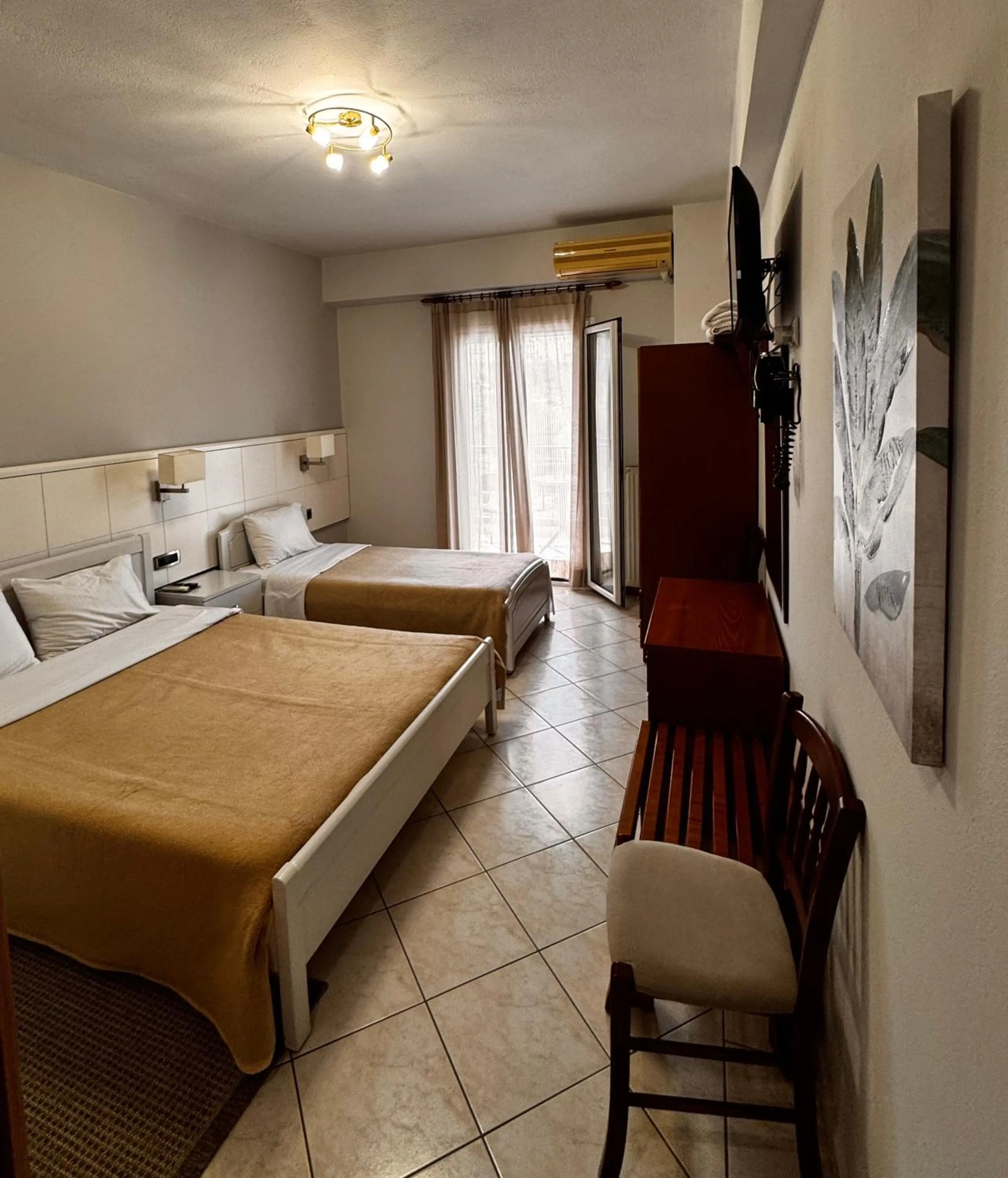 Bed in Paradosi Rooms