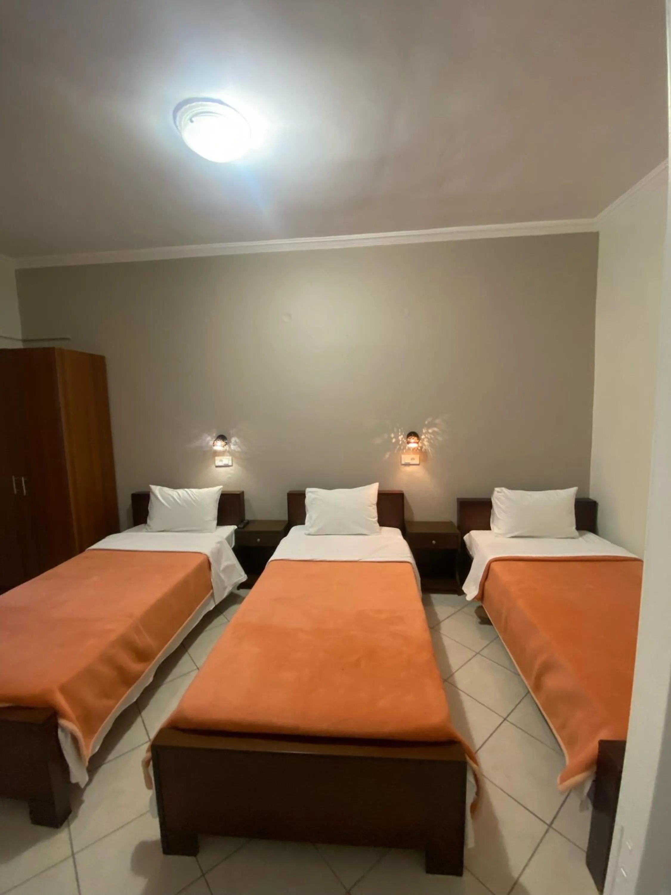 Bed in Paradosi Rooms