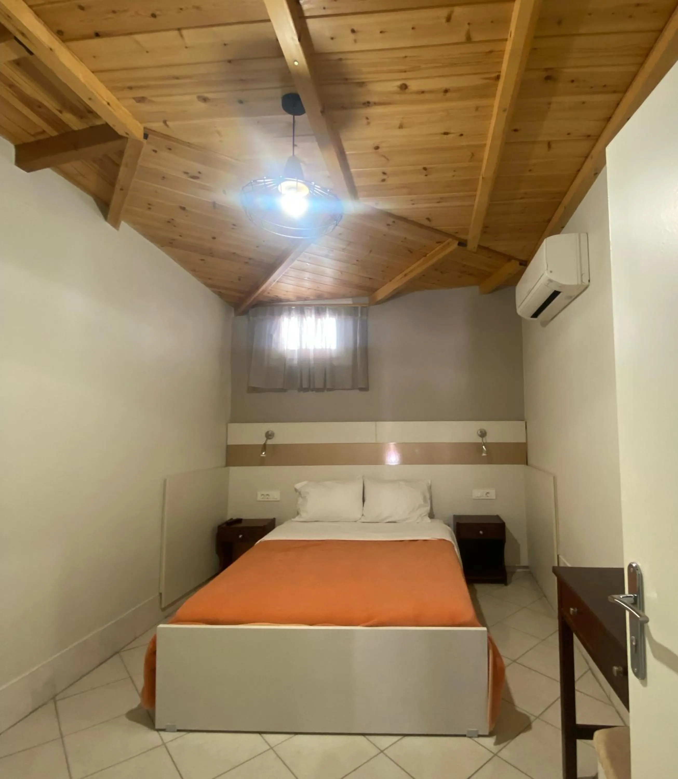 Bed in Paradosi Rooms