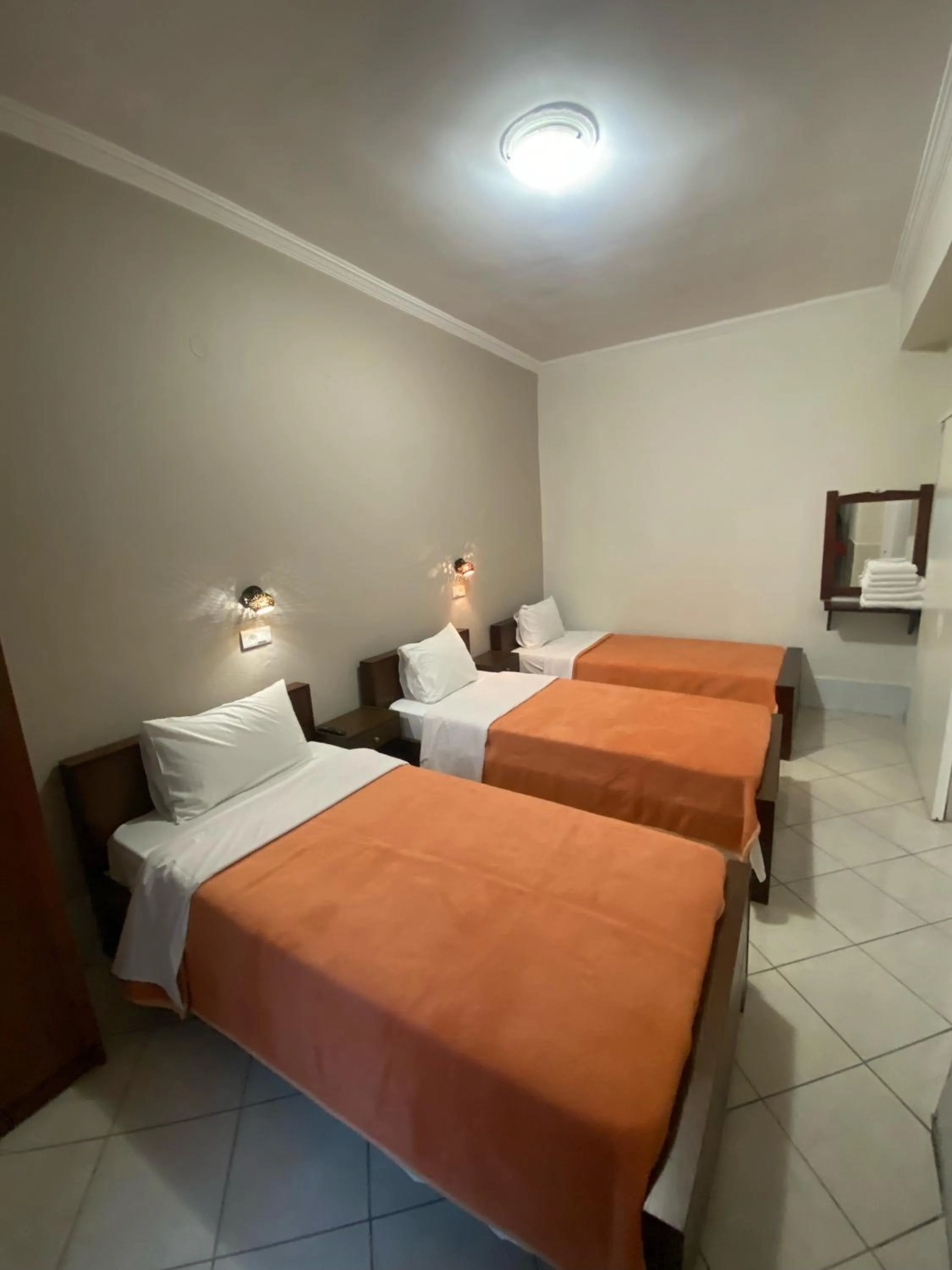 Bed in Paradosi Rooms