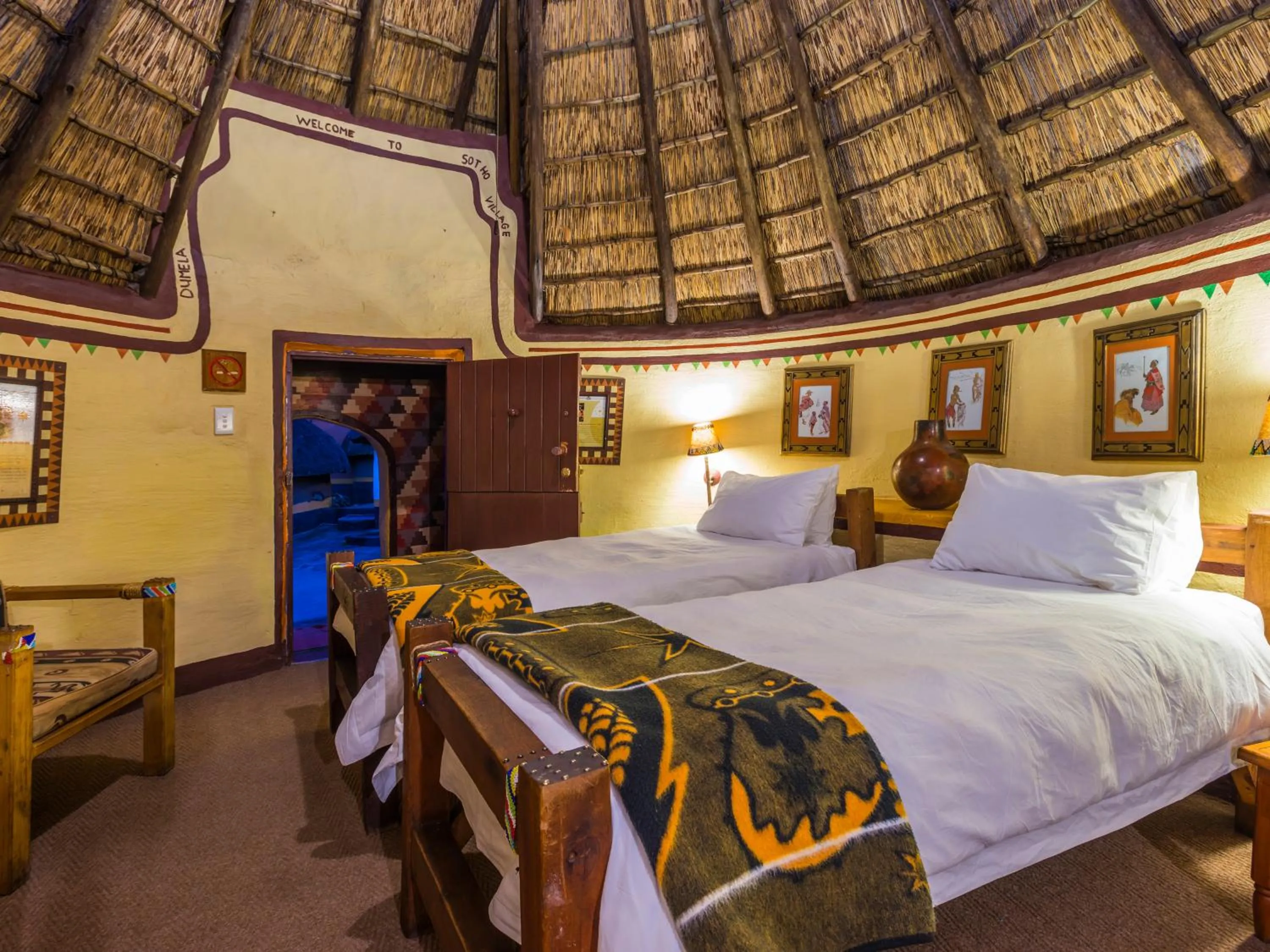 View (from property/room), Bed in aha Lesedi African Lodge & Cultural Village