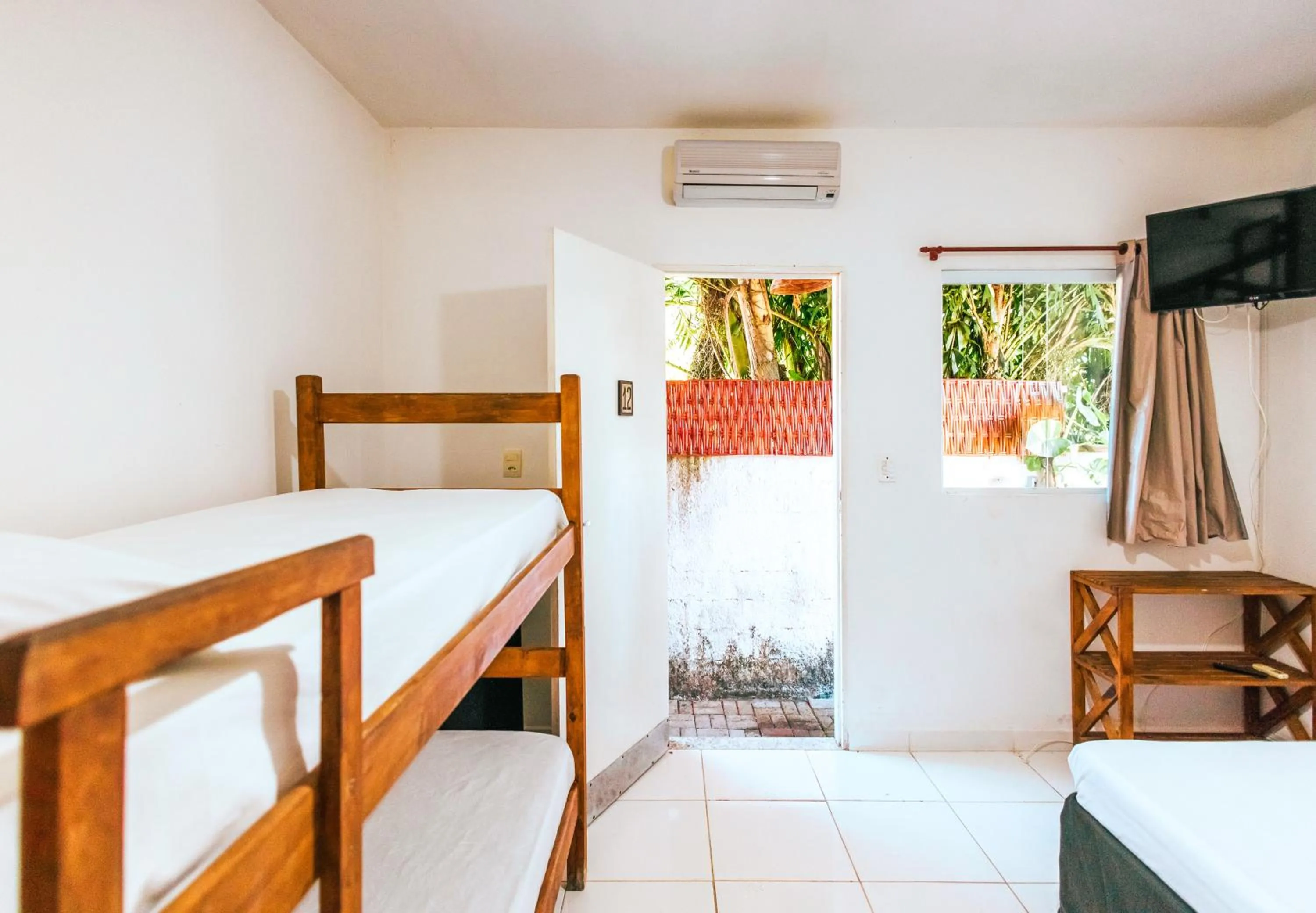 Bed in Pousada Sol Nascente