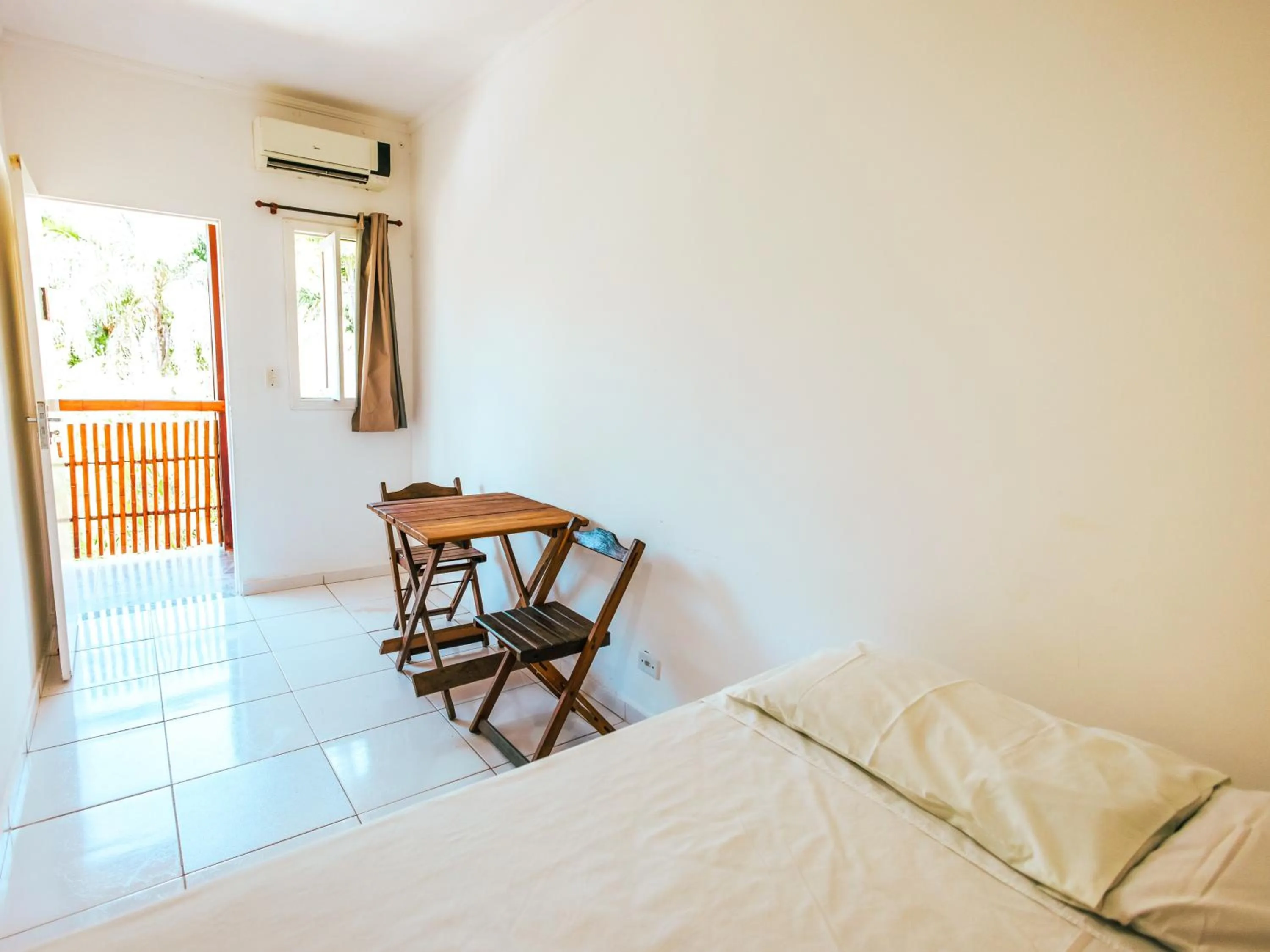 Bed in Pousada Sol Nascente