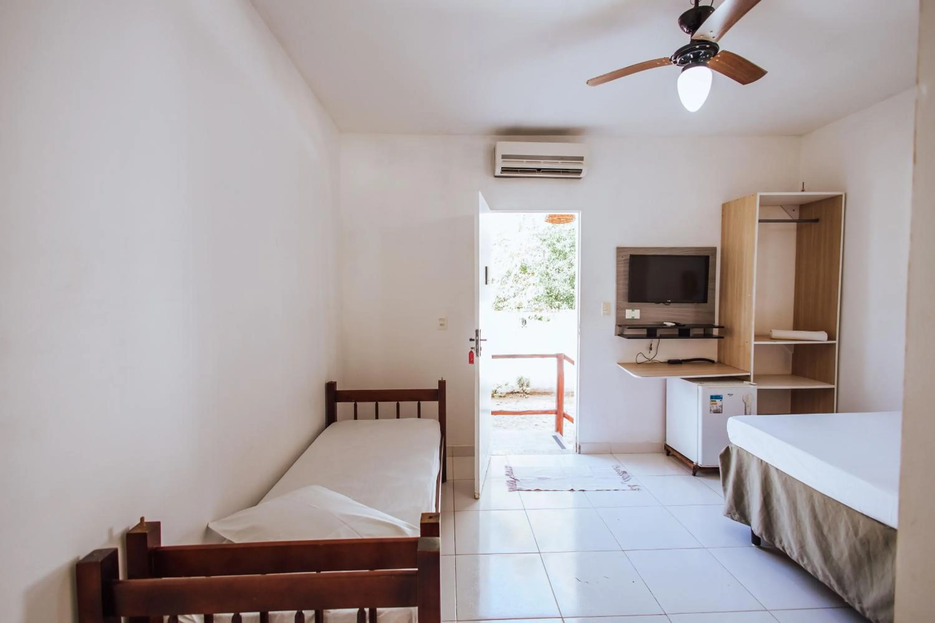 Bed in Pousada Sol Nascente