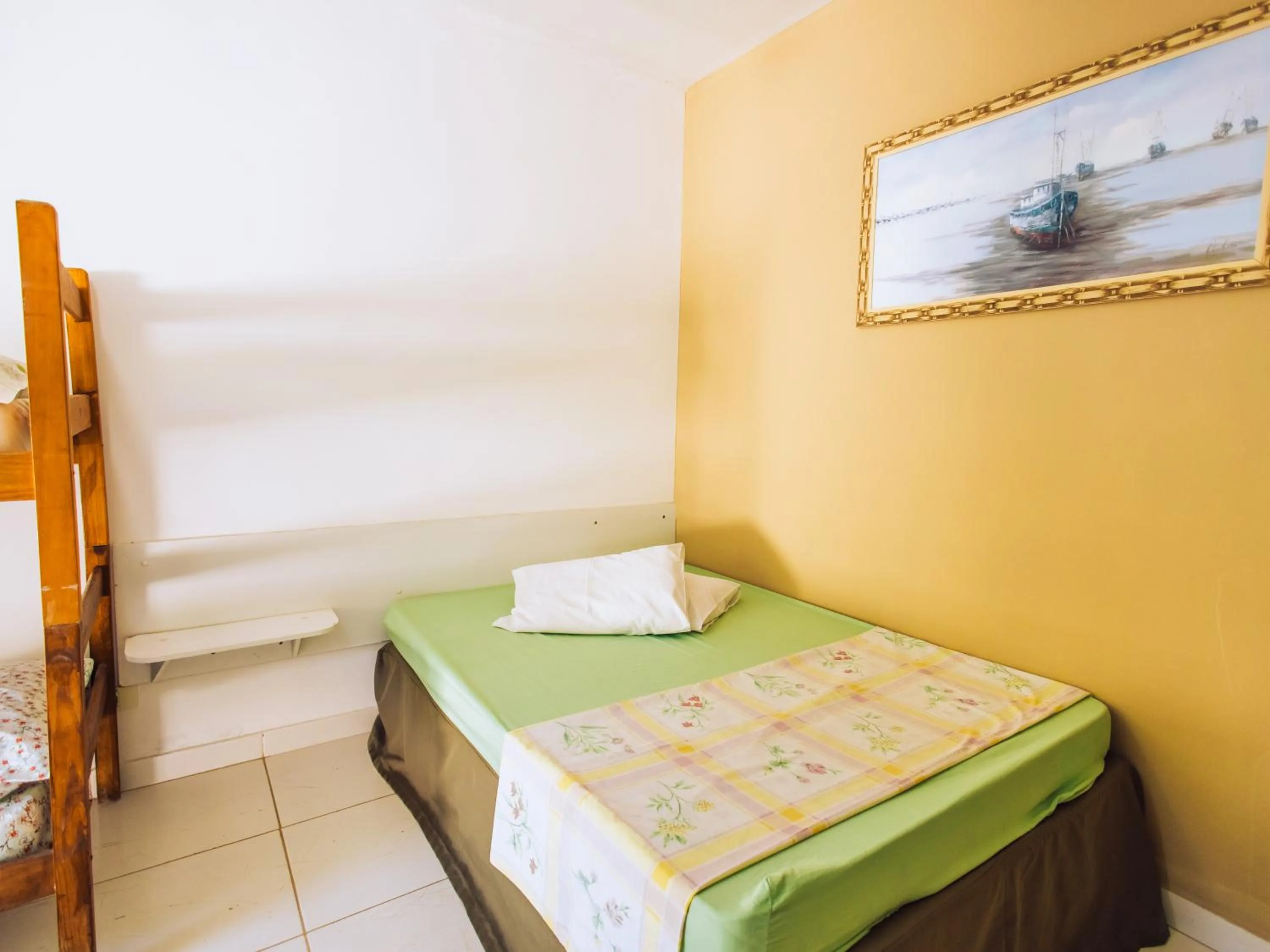 Bed in Pousada Sol Nascente