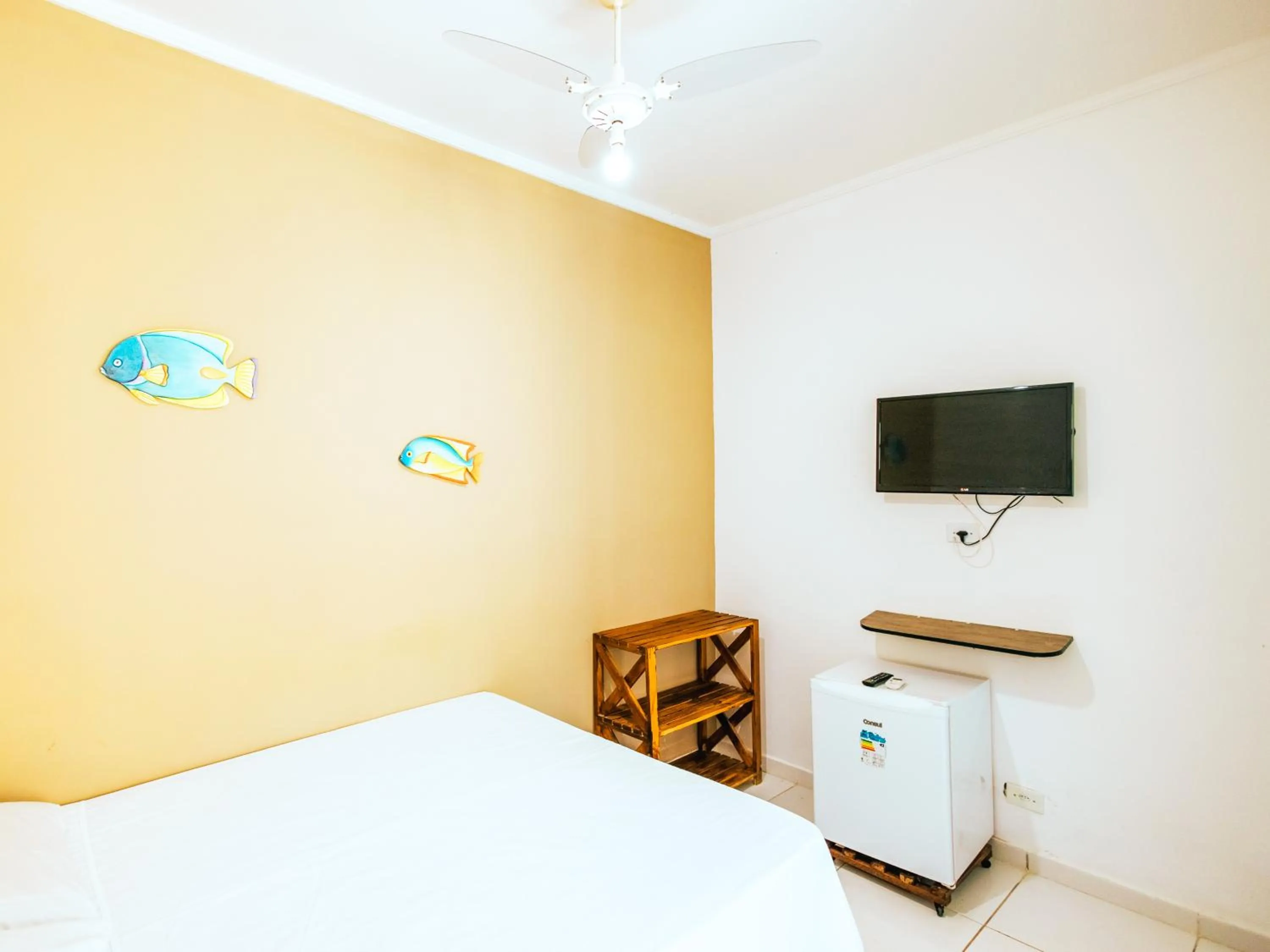 Communal lounge/ TV room in Pousada Sol Nascente