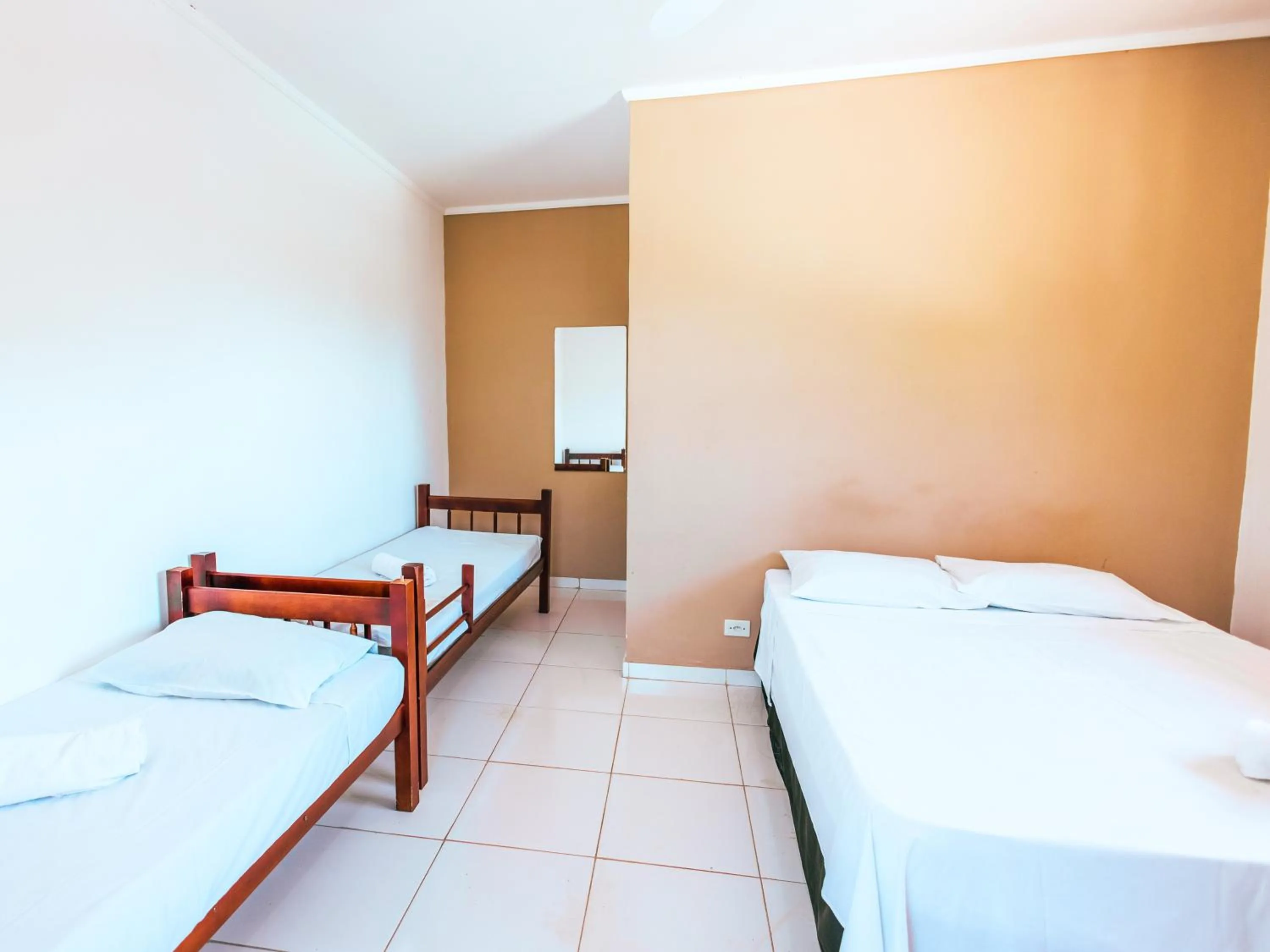 Bed in Pousada Sol Nascente