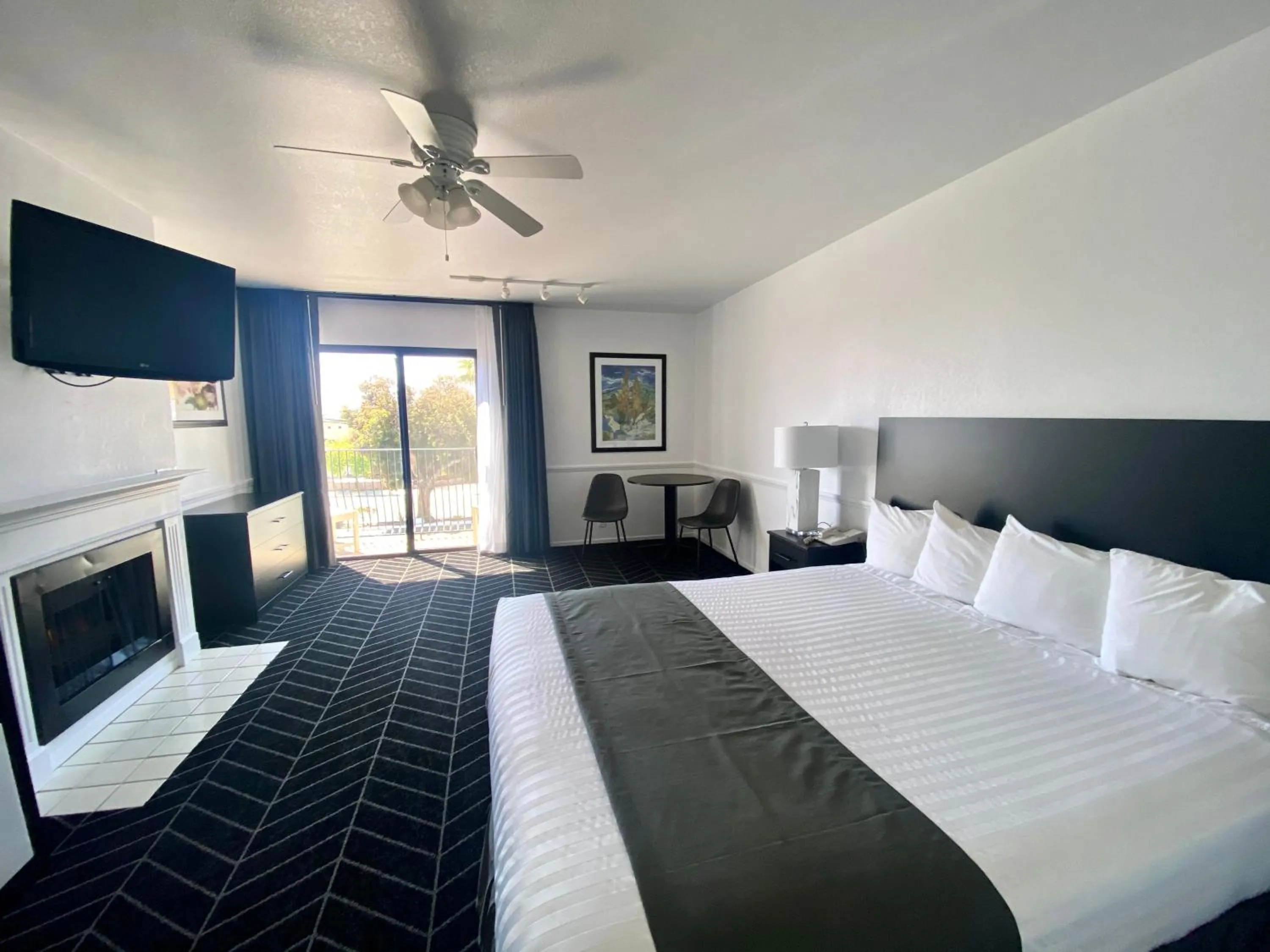 Bed in Masterpiece Hotel