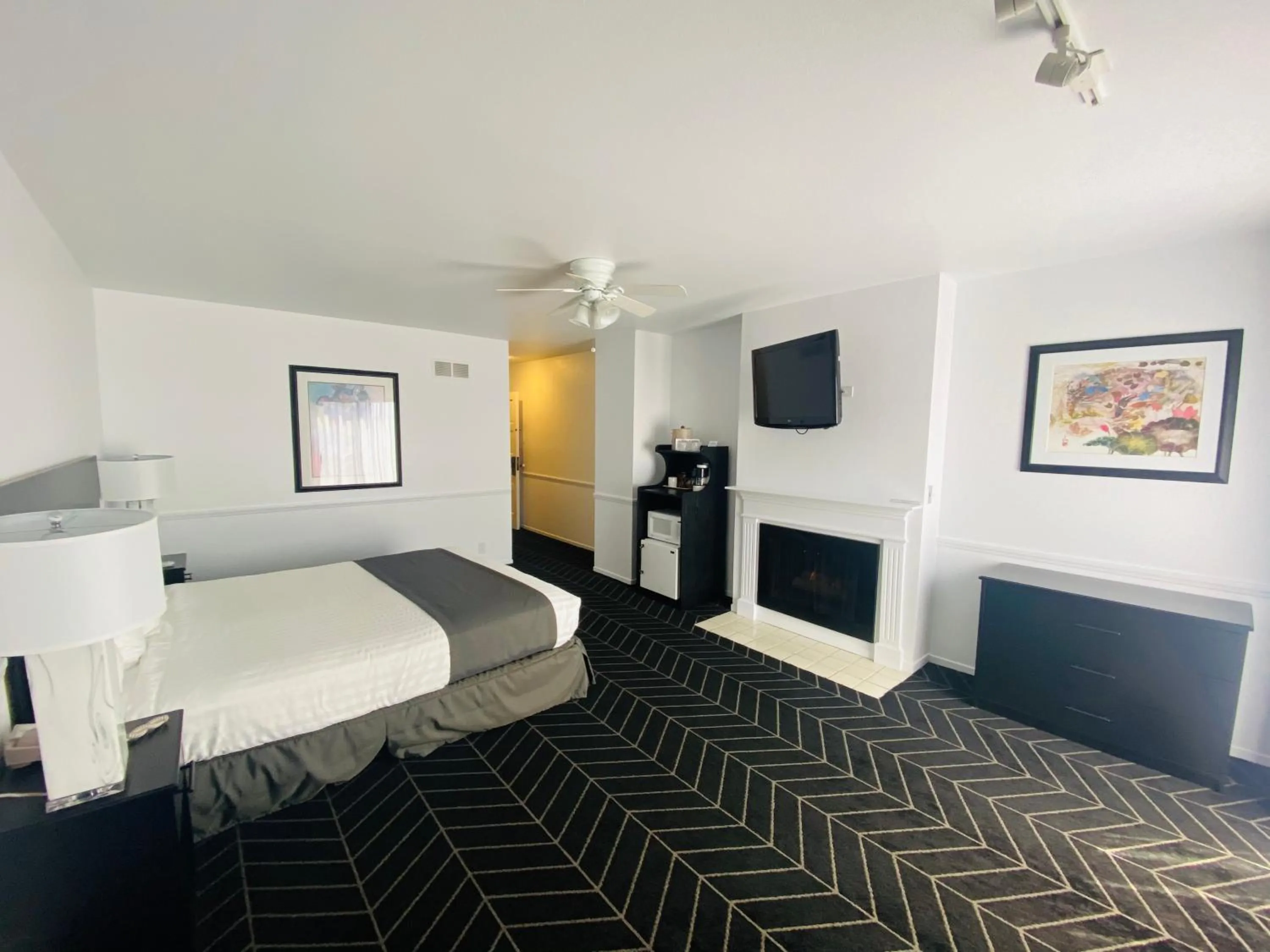 Bed in Masterpiece Hotel