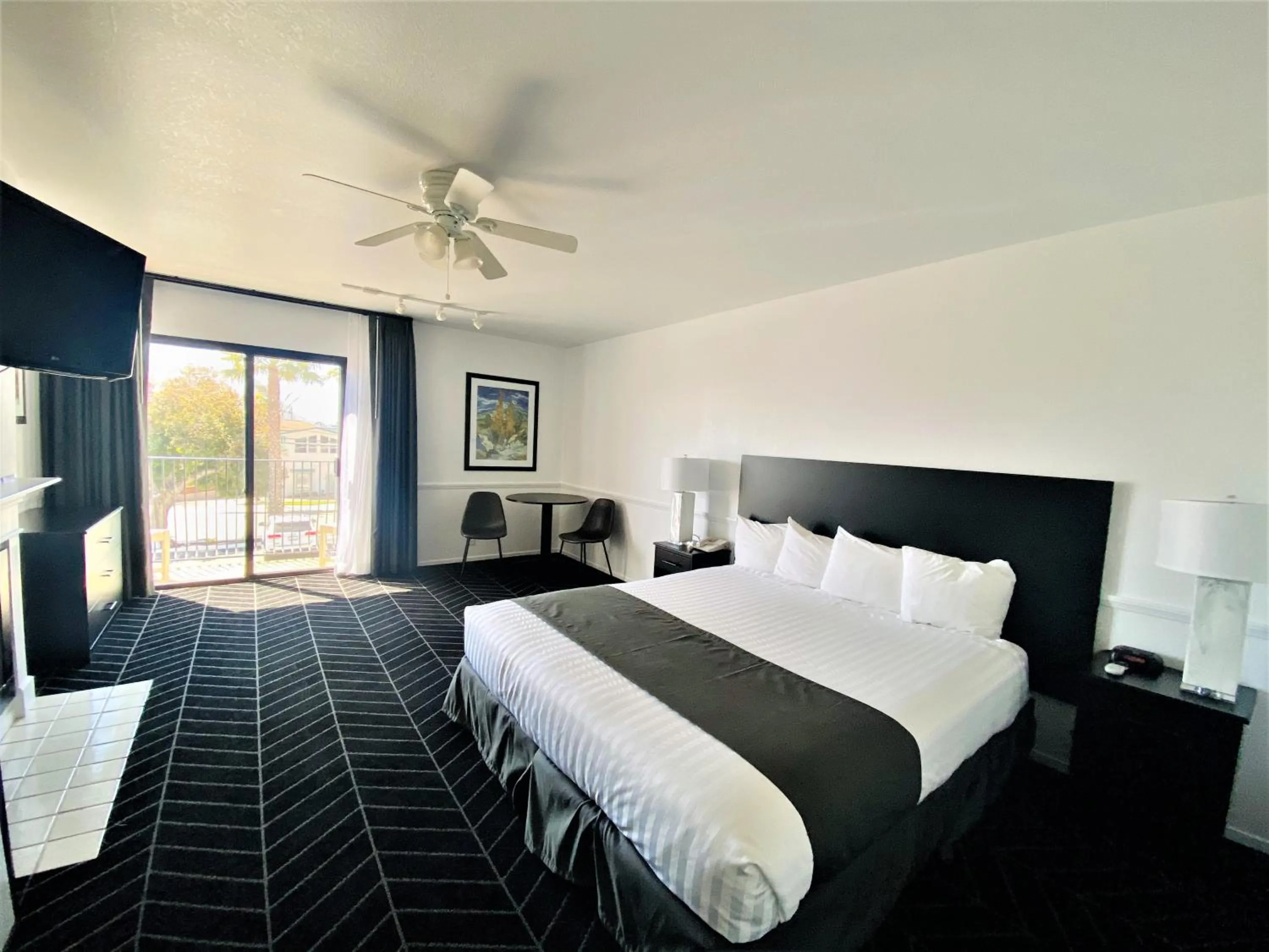 Bed in Masterpiece Hotel