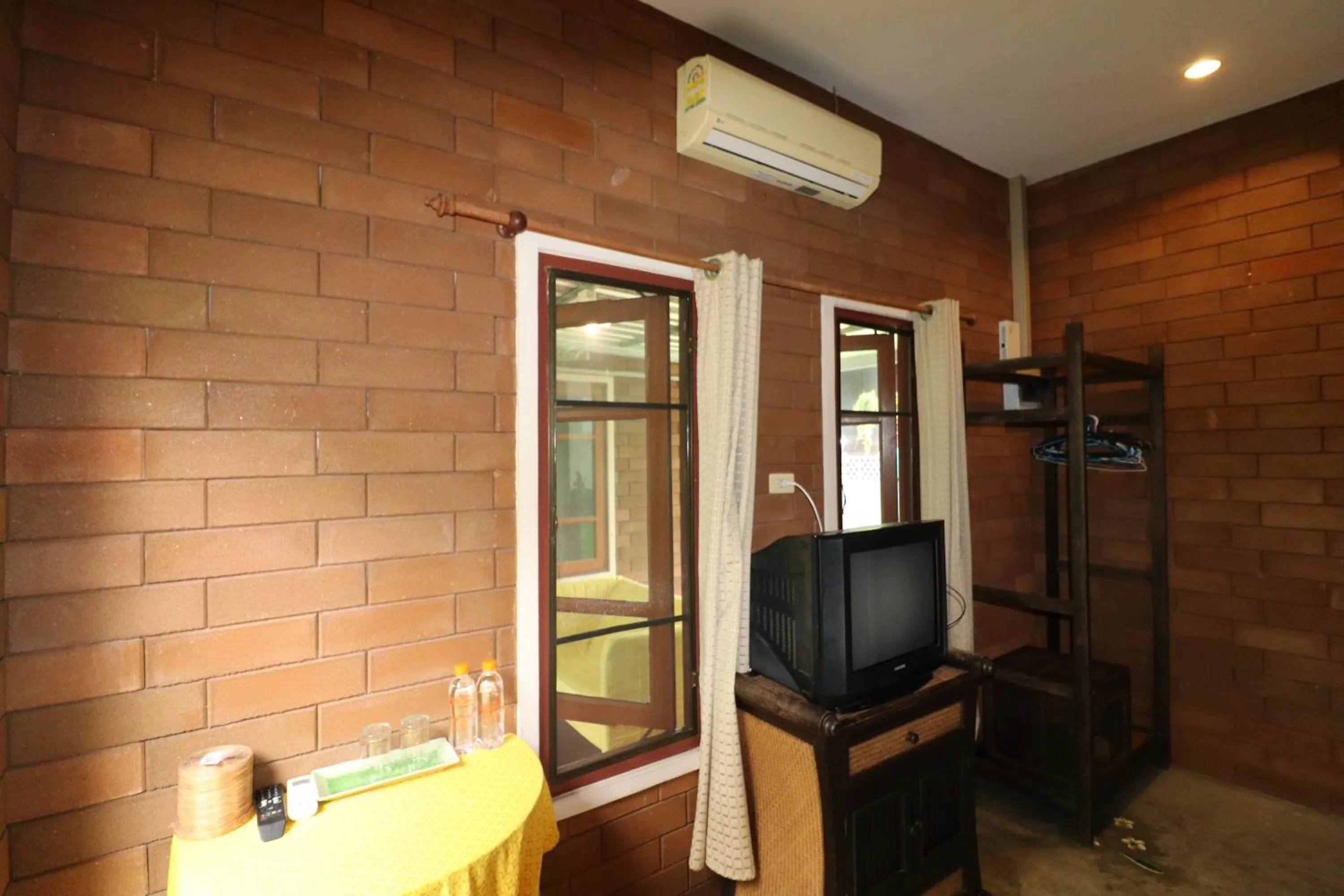 TV/Entertainment Center in GongKaew HuenKum Hotel