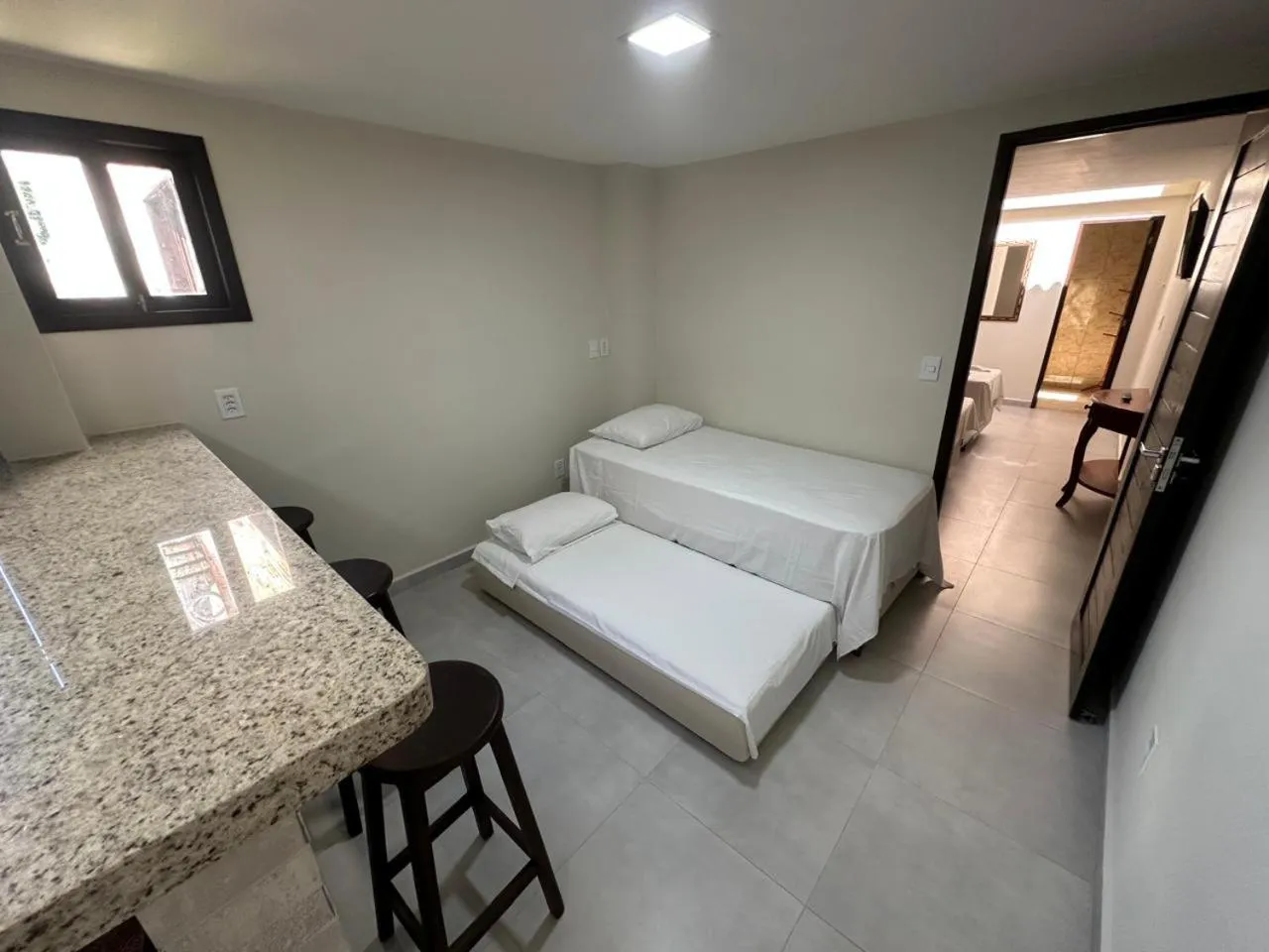 Bed in Pousada Beija Flor