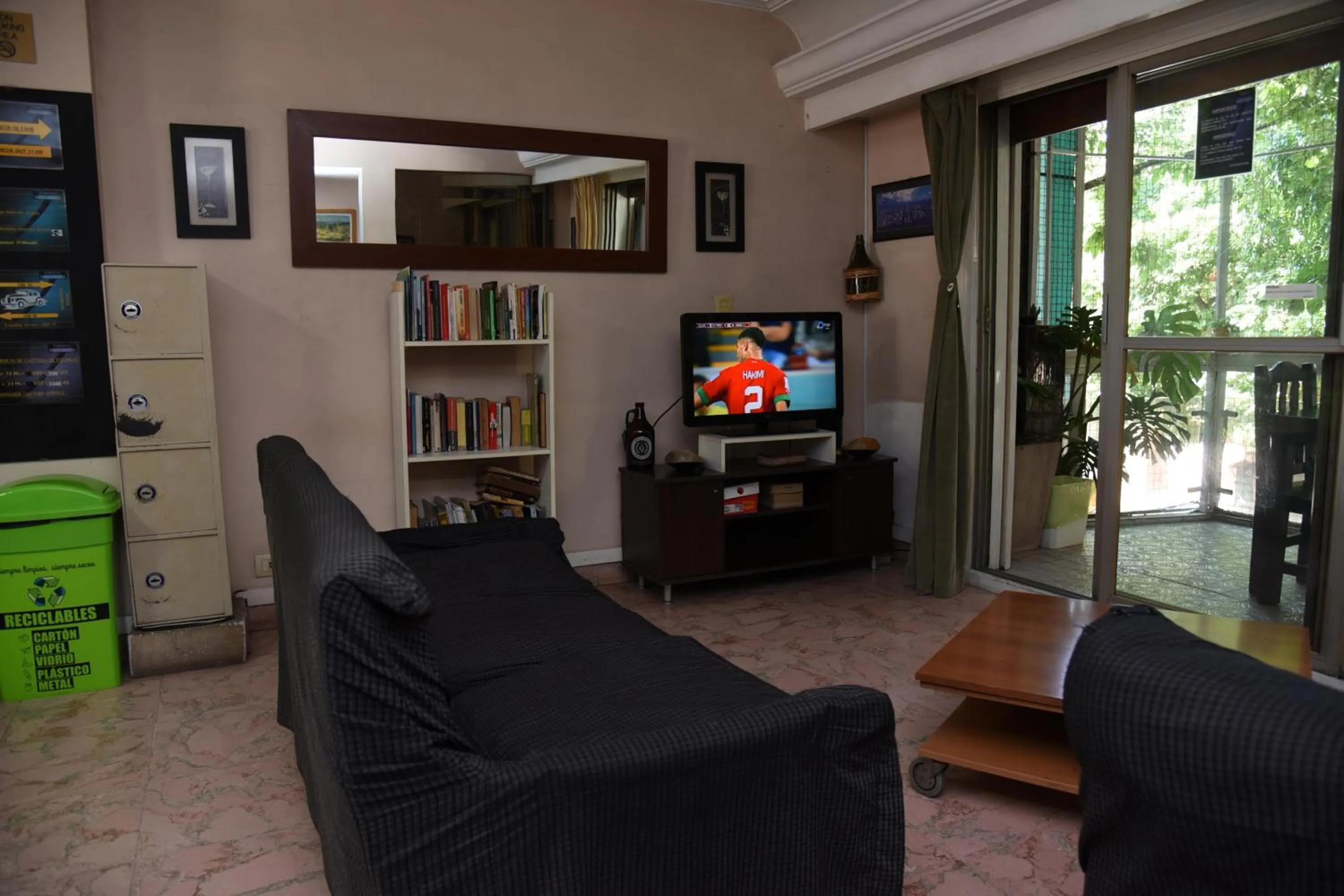 Communal lounge/ TV room in Palermo Soho Hostel