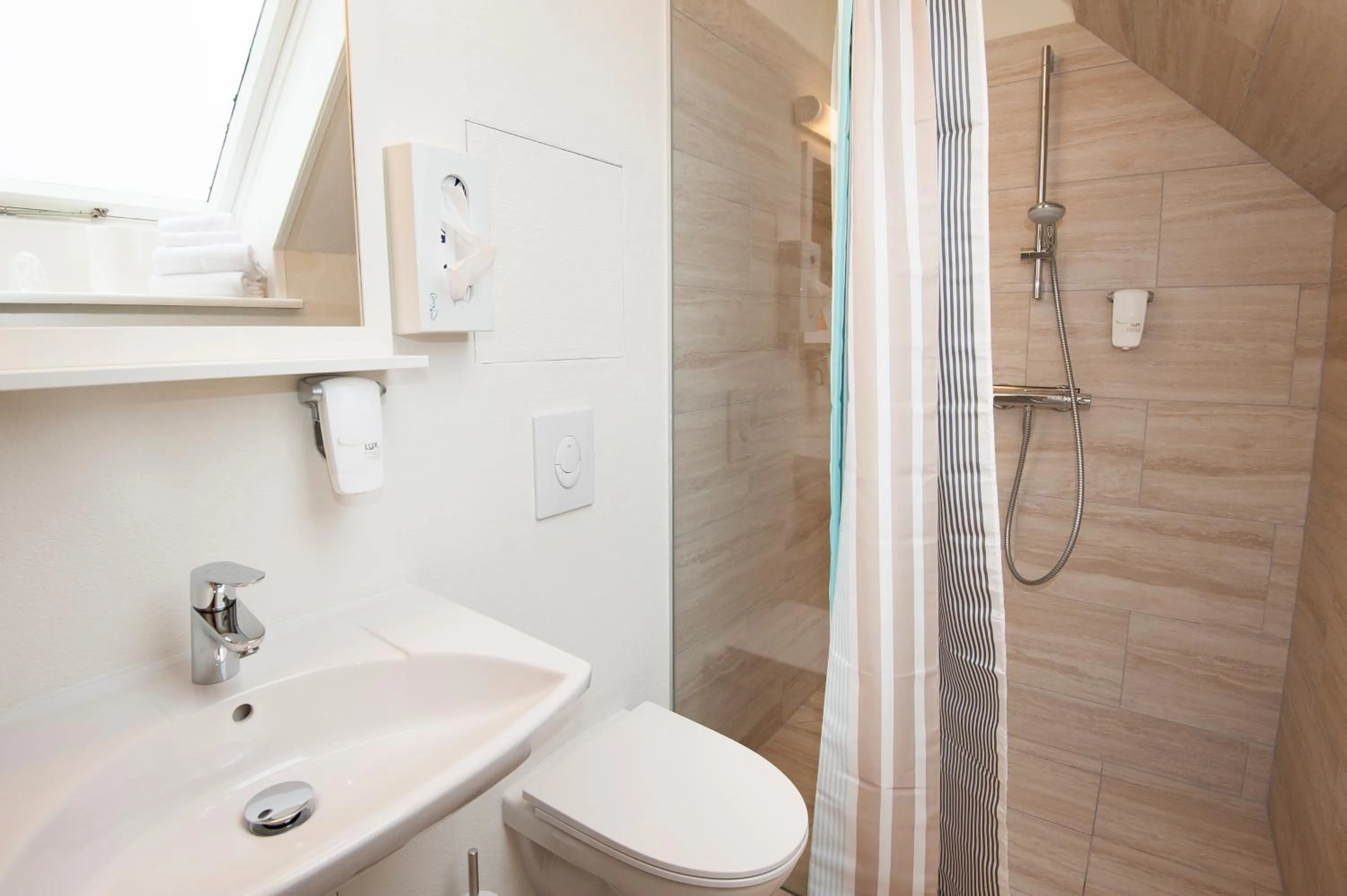 Shower in Gendarmhotellet