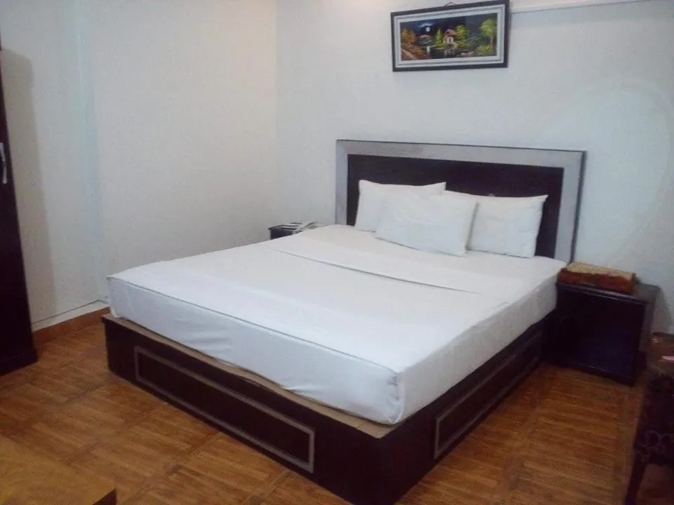 Bed in Hotel Mehran Multan