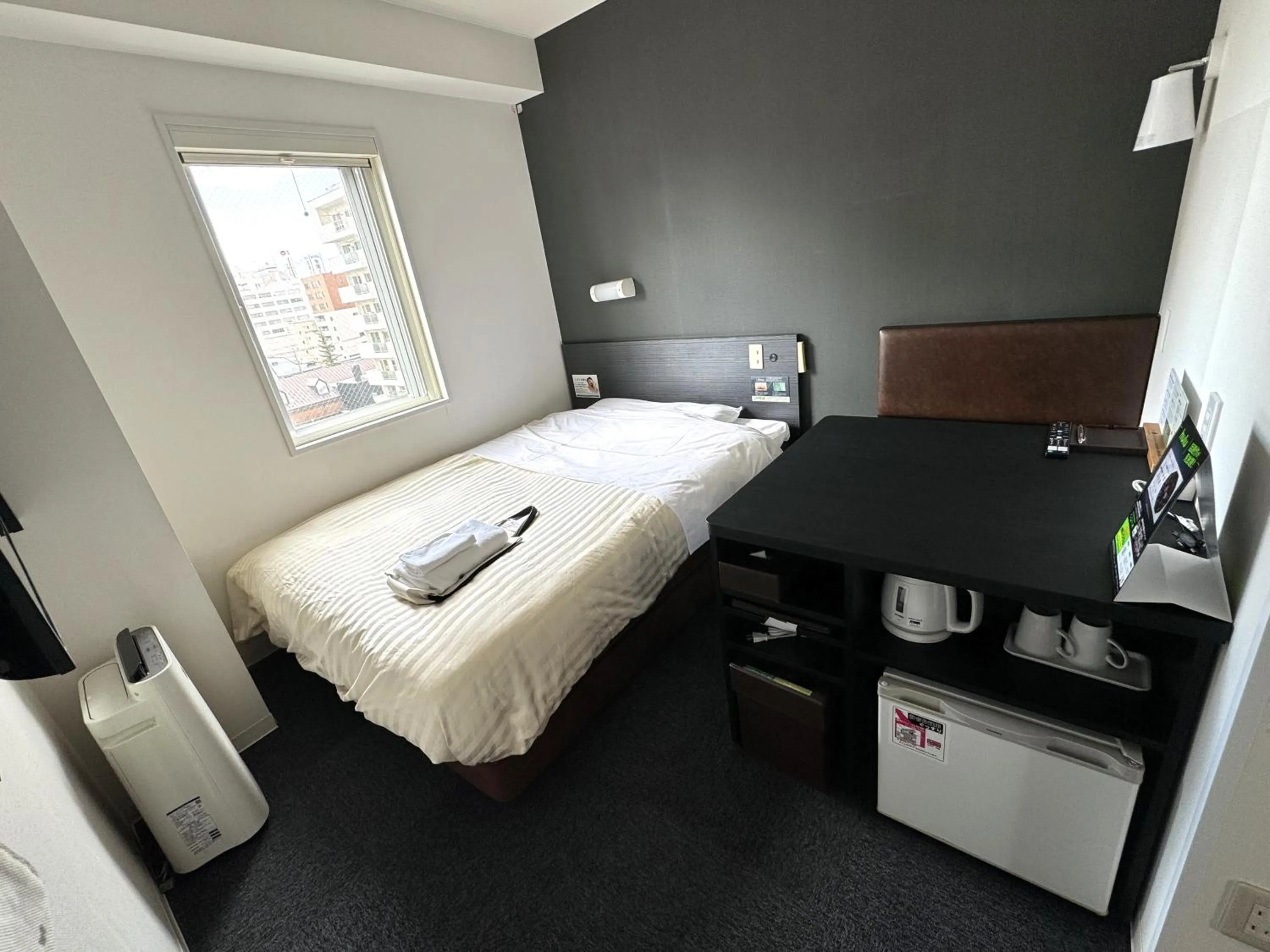 Bed in Super Hotel Asahikawa