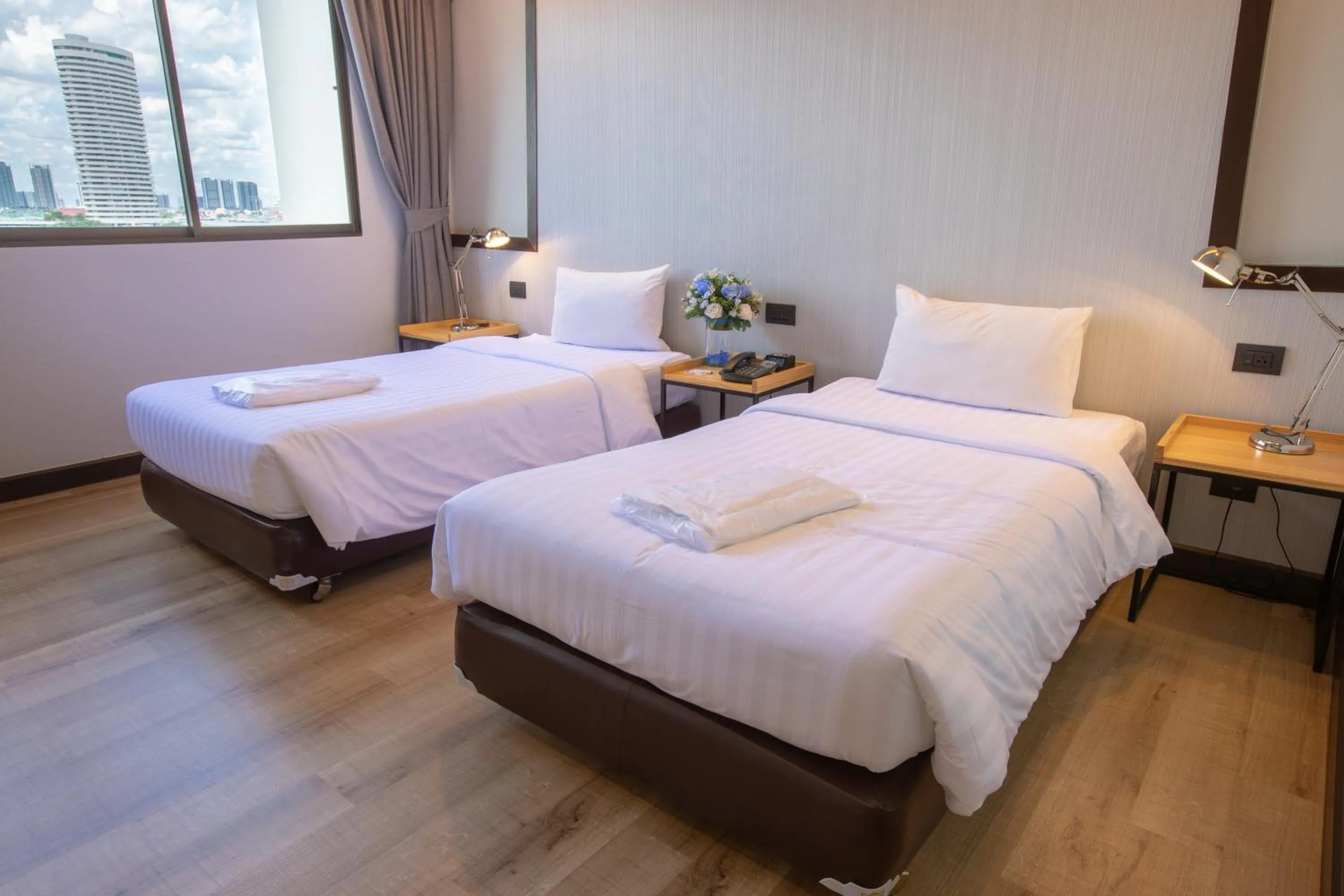 Bed in The Royal River Hotel