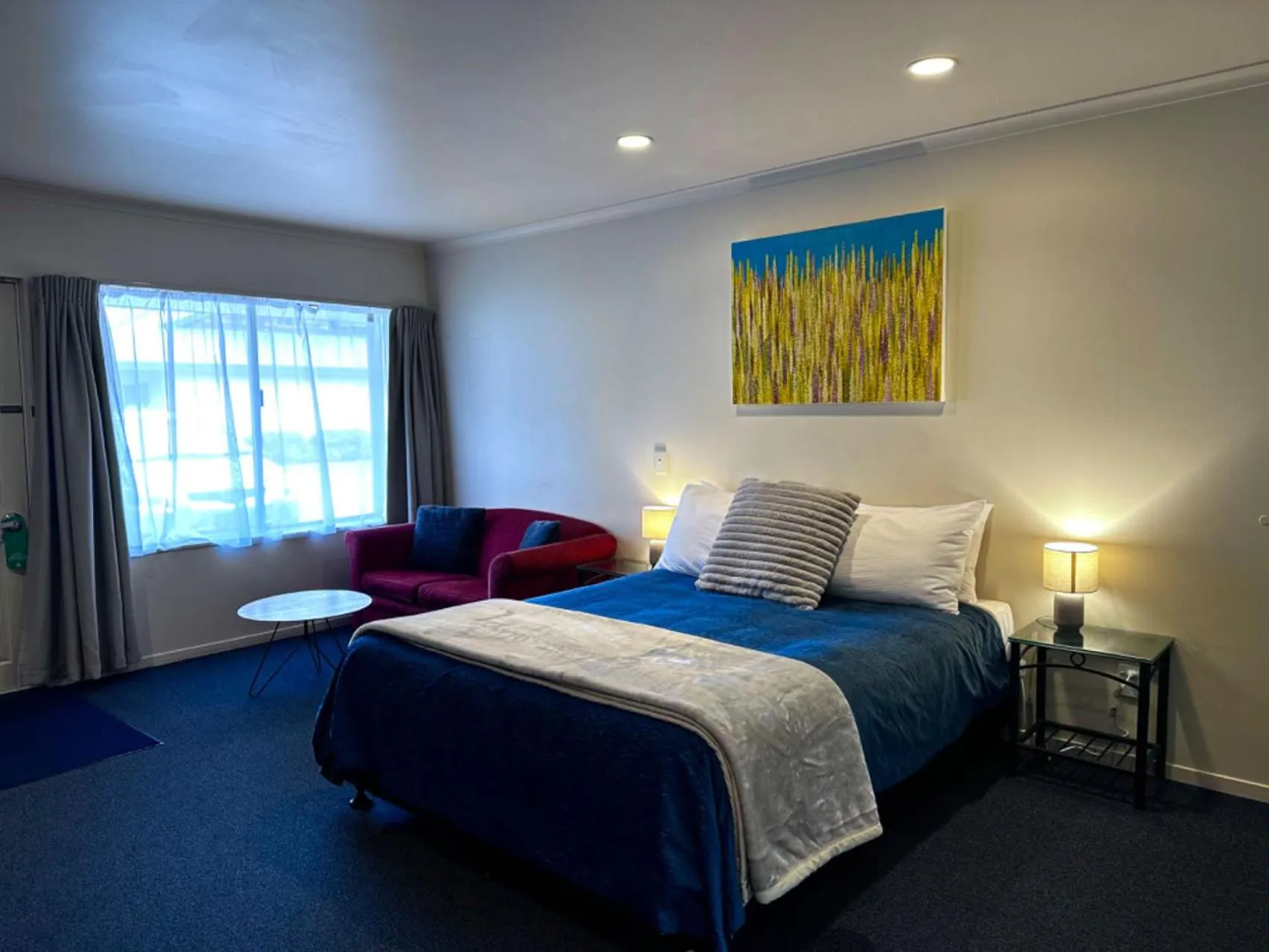 Bed in Harringtons Motor Lodge