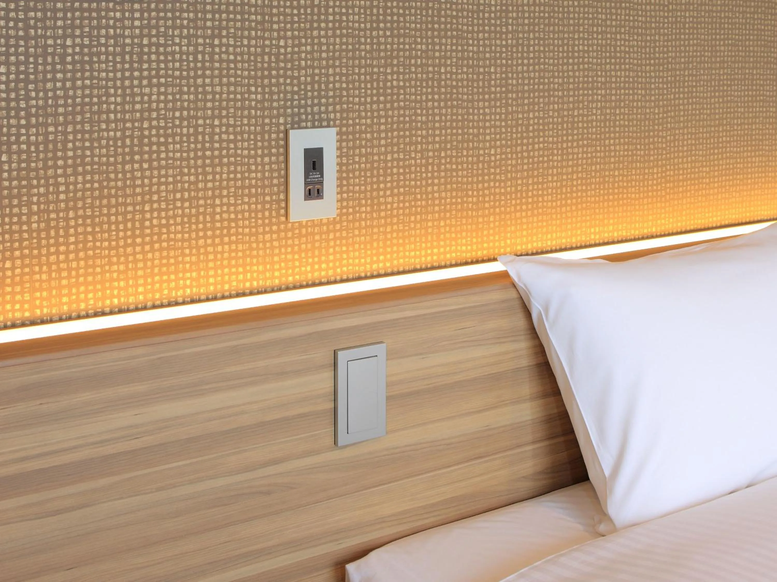 Decorative detail, Bed in Hotel Elcient Kyoto Hachijoguchi