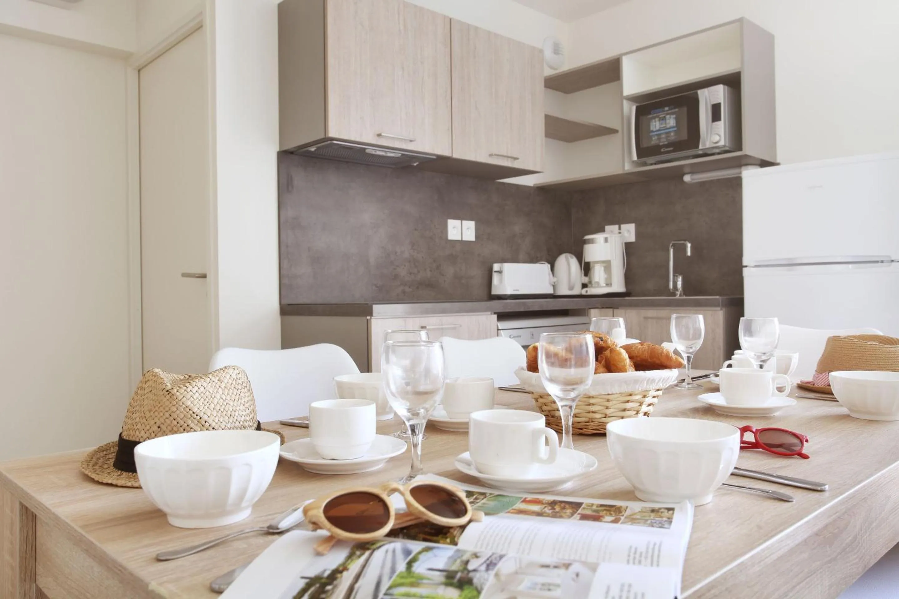 Kitchen or kitchenette in Résidence Odalys Fleur de Sel