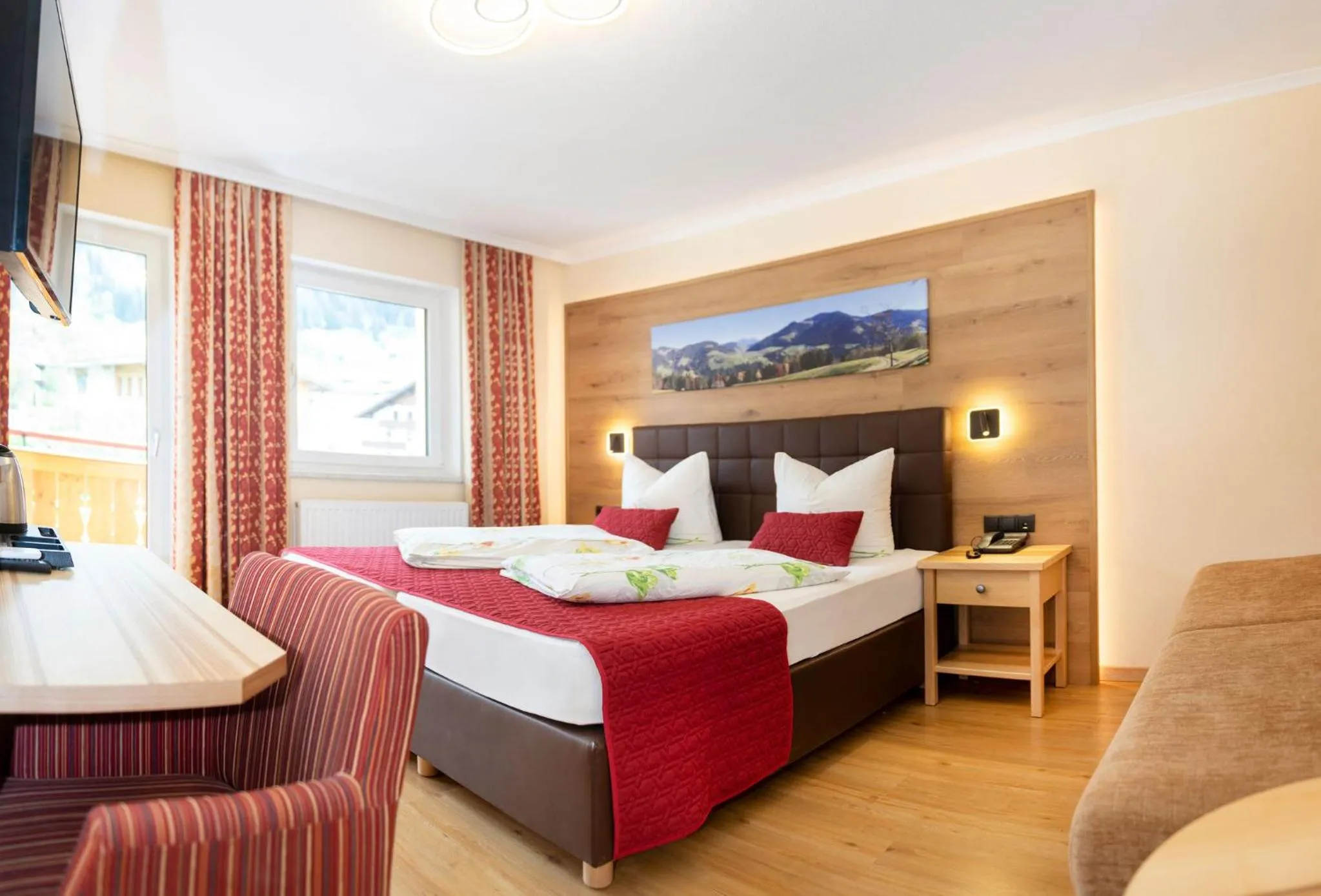 Photo of the whole room, Bed in Hotel Schneeberger