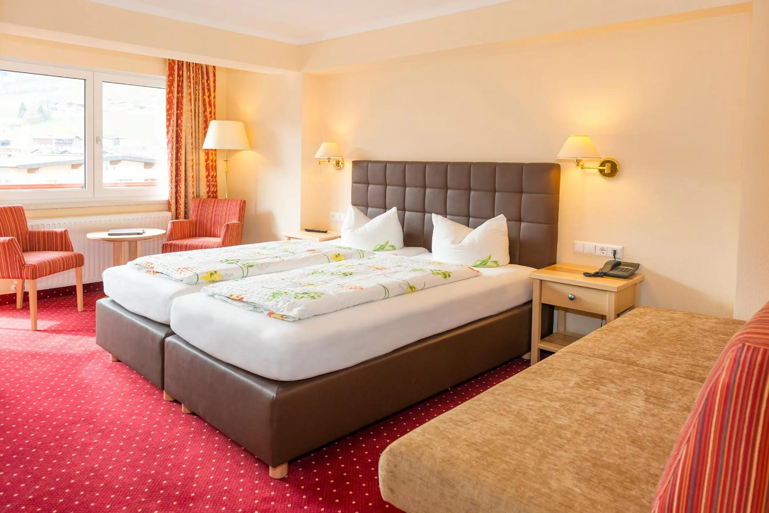 Photo of the whole room, Bed in Hotel Schneeberger