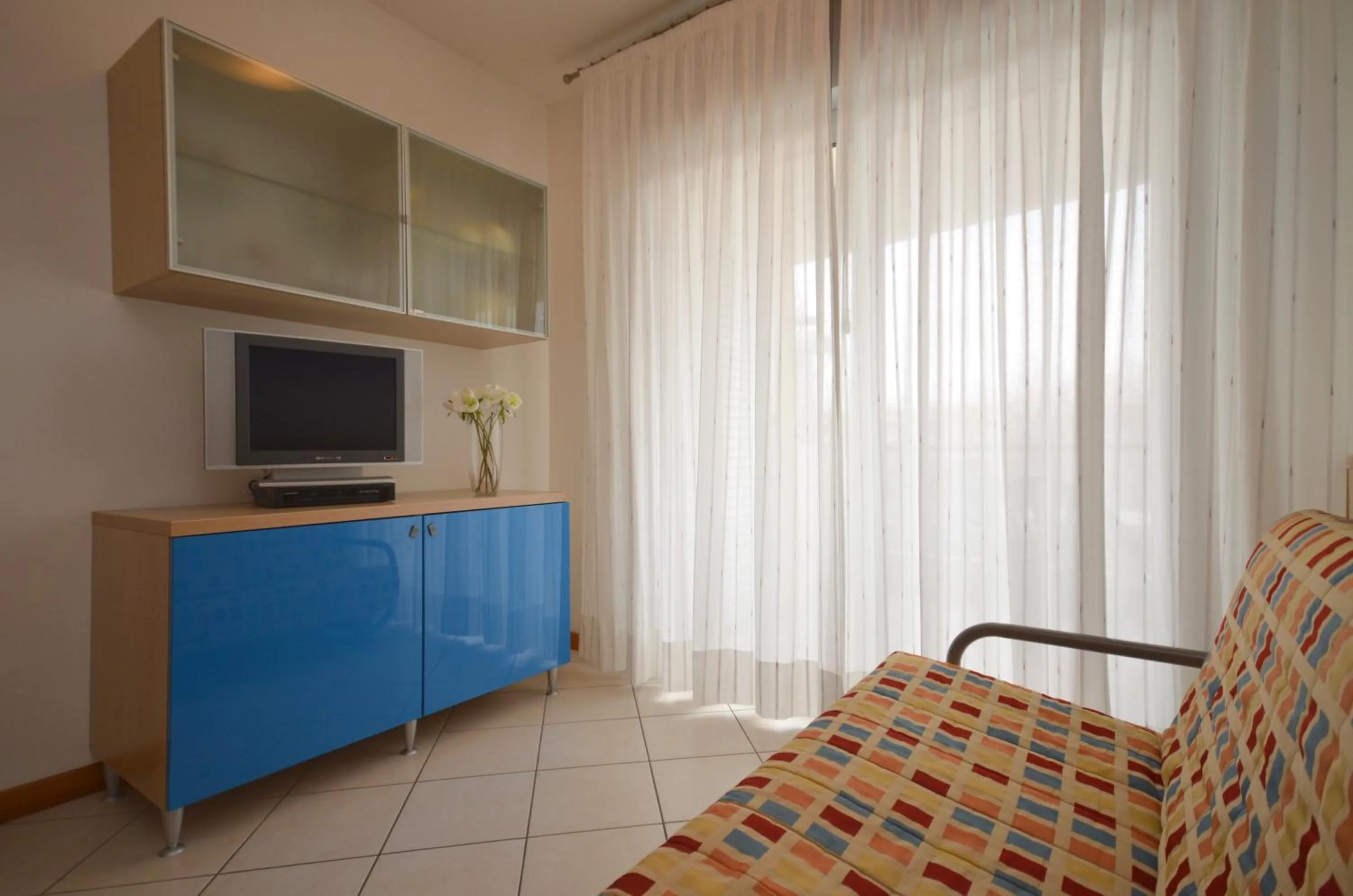 Living room, Bed in Villaggio Planetarium Resort