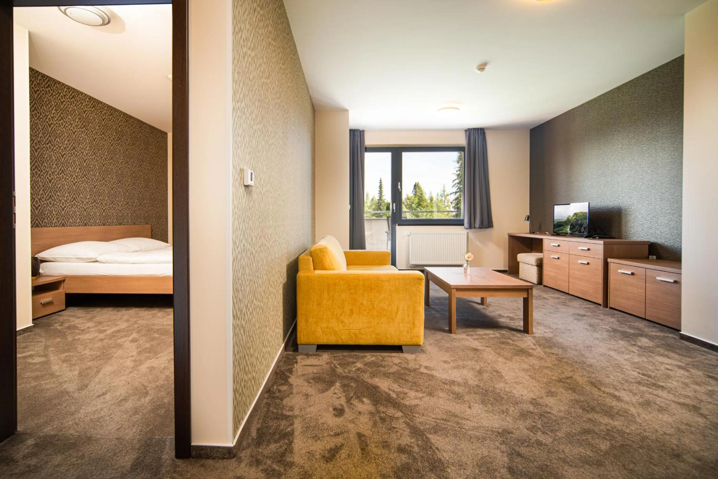 Living room, Bed in Hotel Panorama Resort