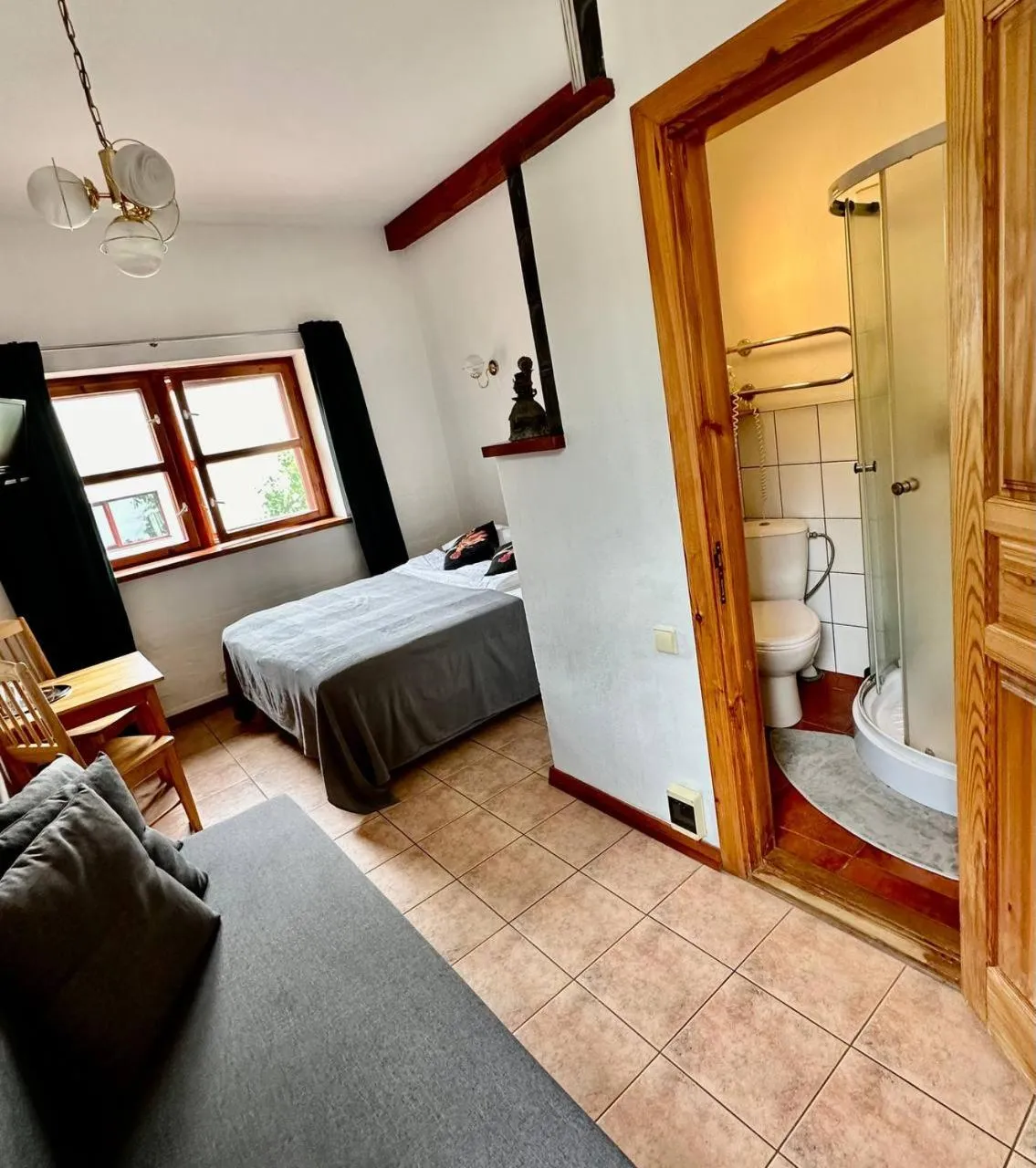 Photo of the whole room, Bed in House of Sun