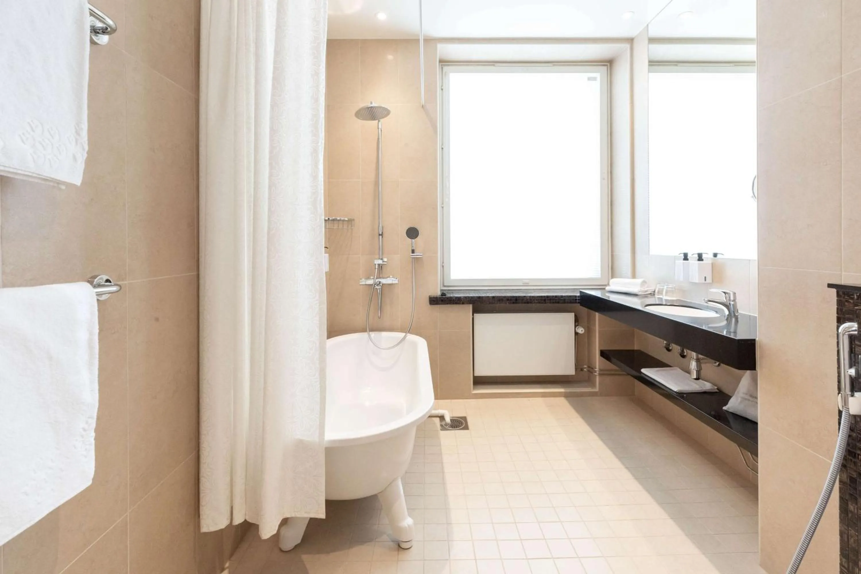 Bathroom in Scandic Atlas