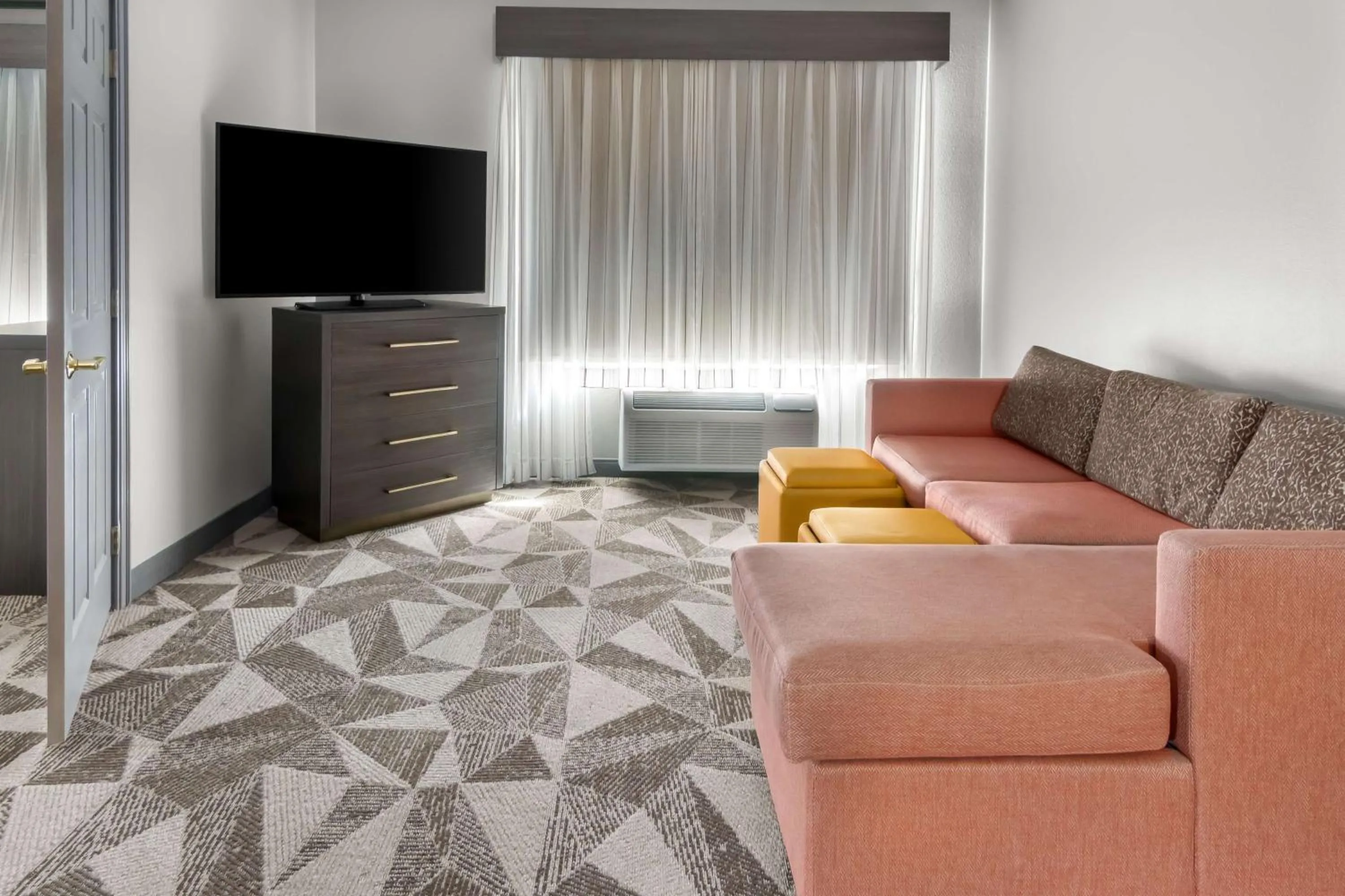 Bedroom in Big Country Hotel & Suites, SureStay Collection by BW