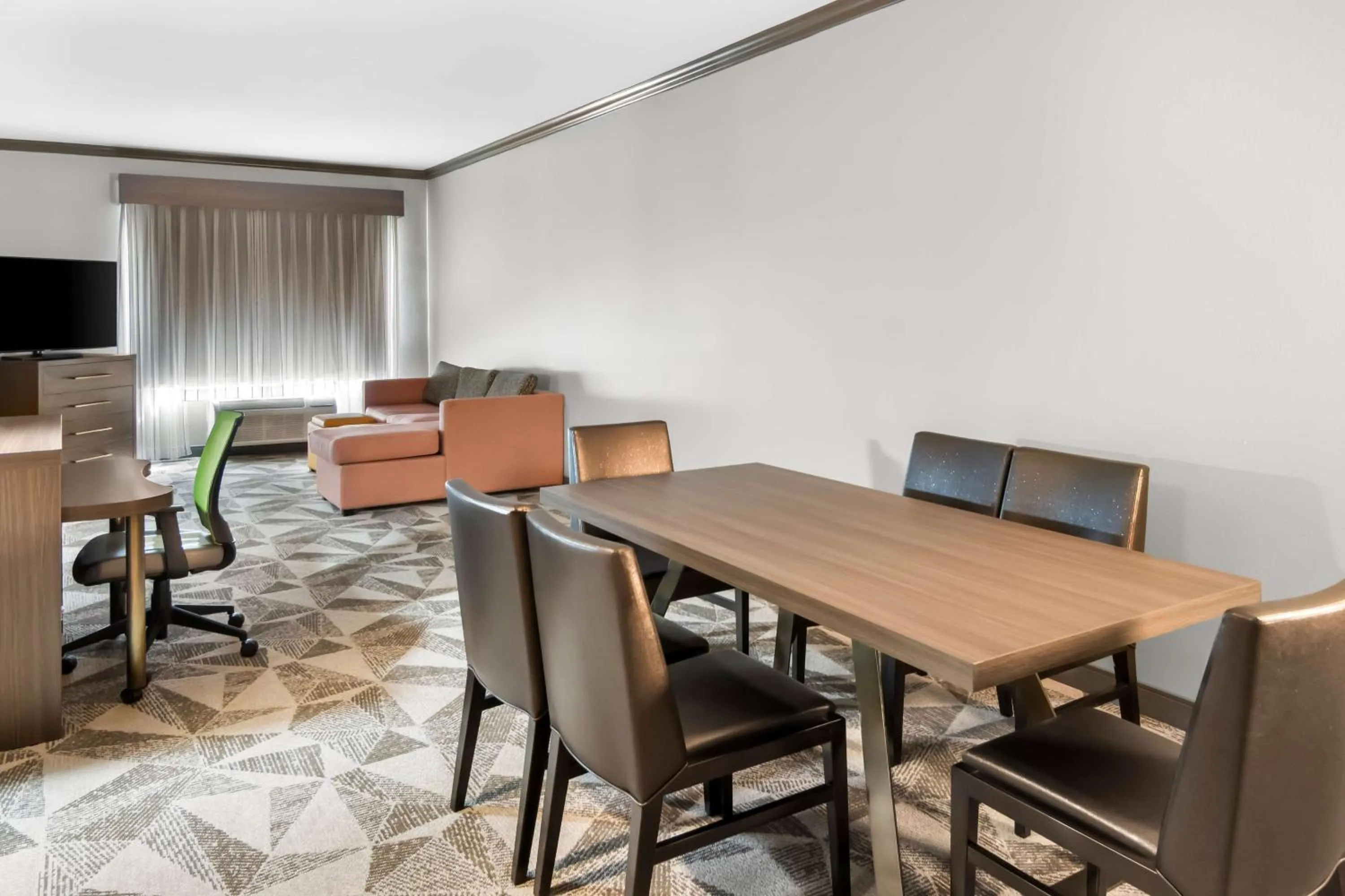 Bedroom in Big Country Hotel & Suites, SureStay Collection by BW