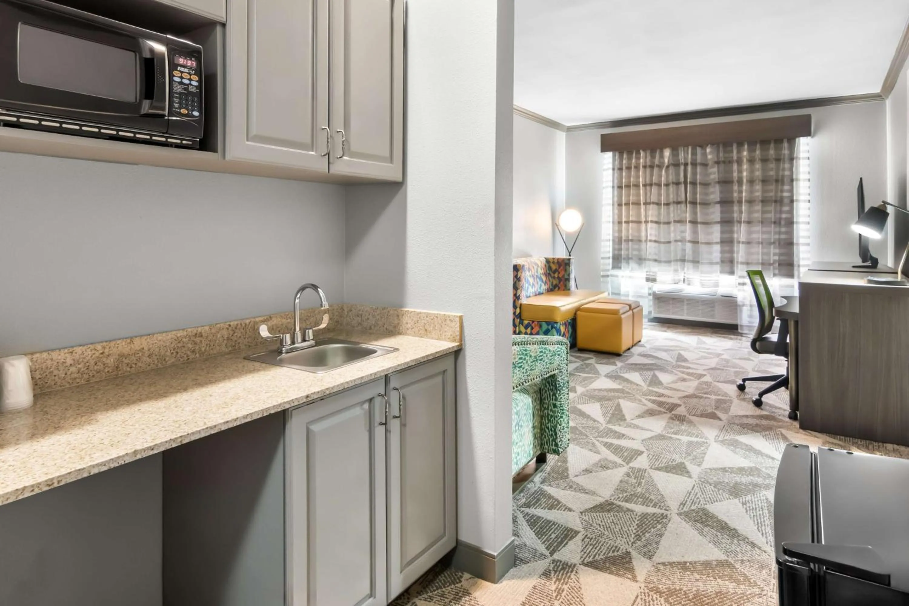 Bedroom in Big Country Hotel & Suites, SureStay Collection by BW