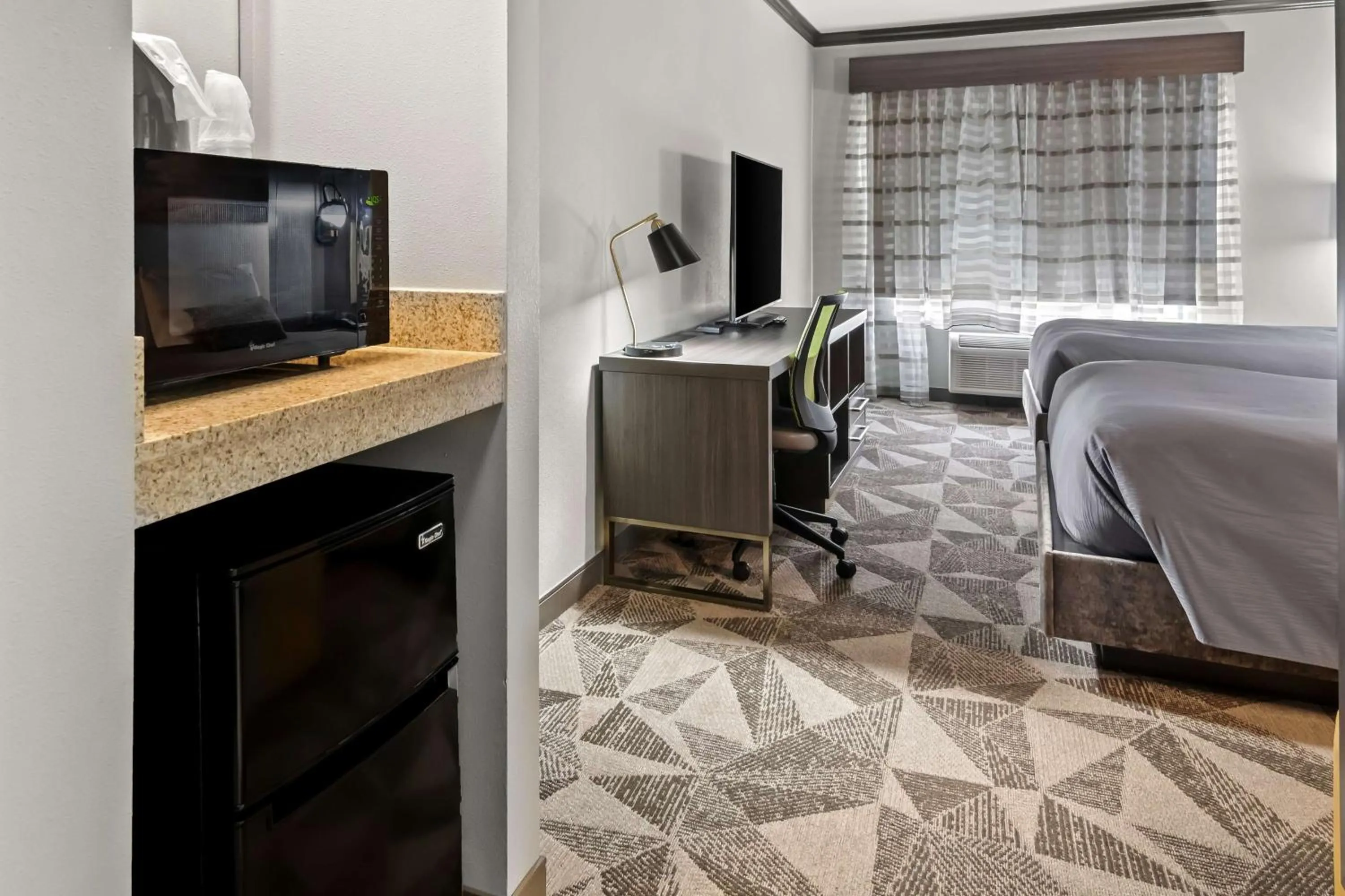 Bedroom, Bed in Big Country Hotel & Suites, SureStay Collection by BW