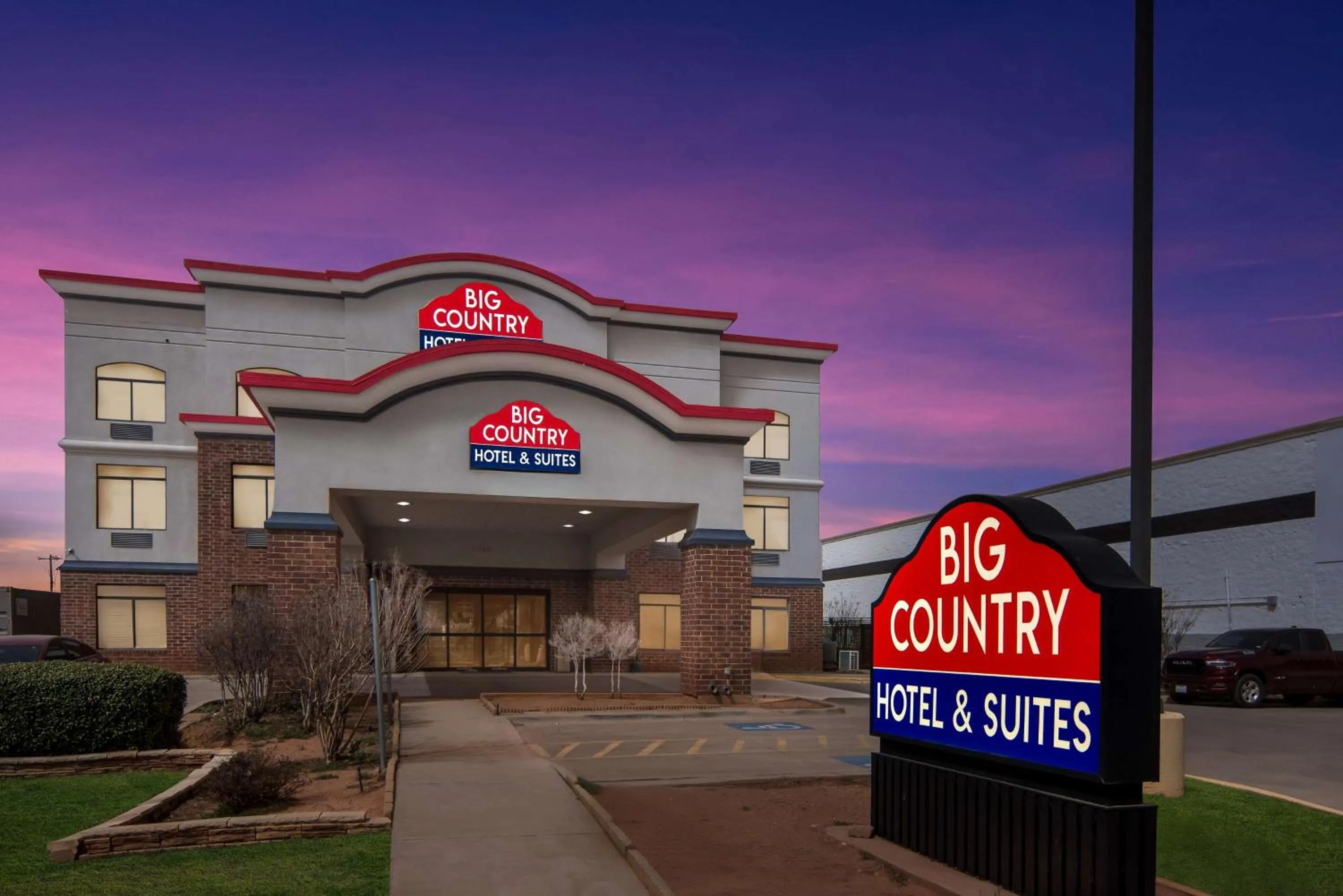 Property building in Big Country Hotel & Suites, SureStay Collection by BW