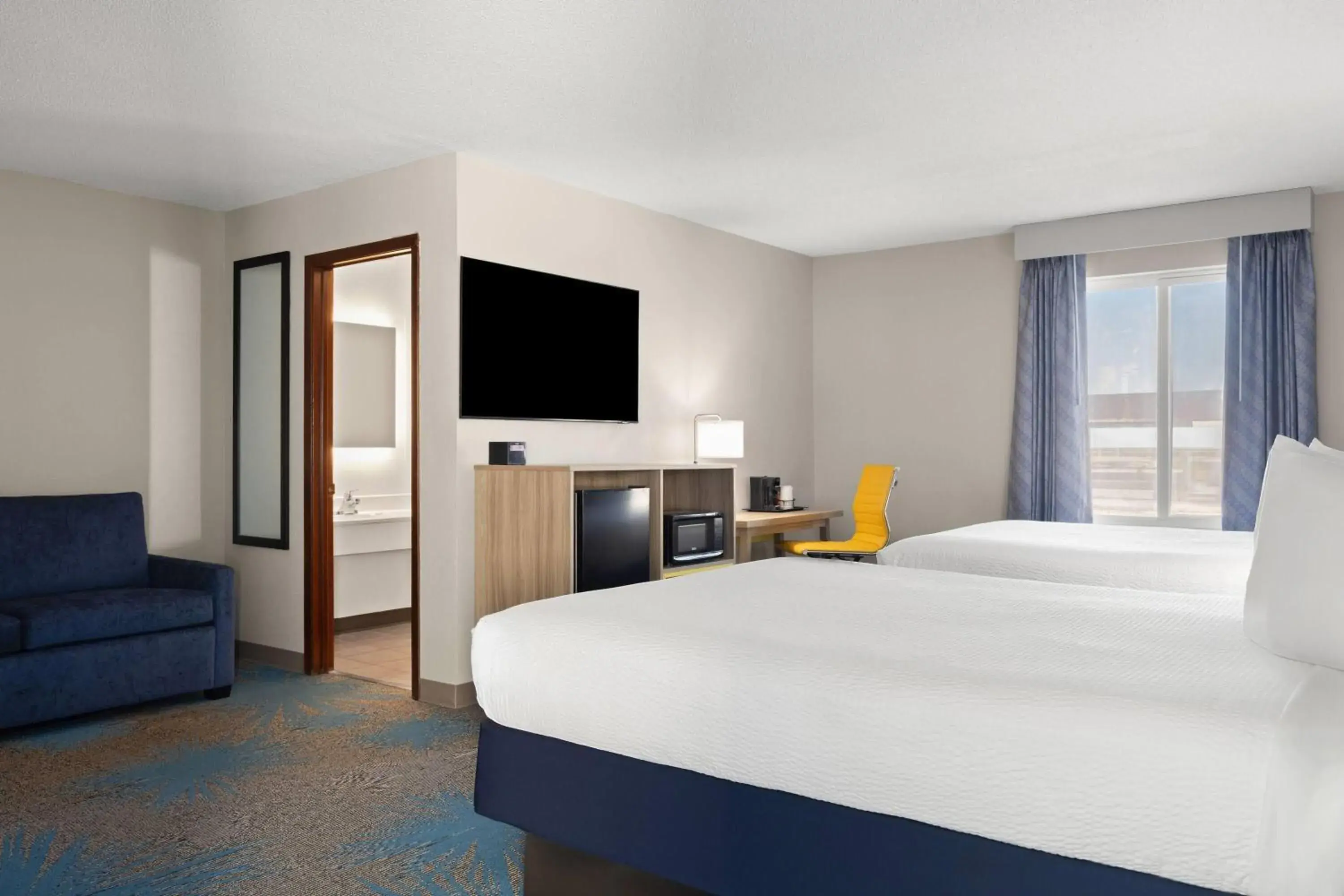 Deluxe Queen Room with Two Queen Beds - Non-Smoking in Days Inn by Wyndham Jamestown Deluxe Queen Room with Two Queen Beds - Non-Smoking in Days Inn by Wyndham Jamestown