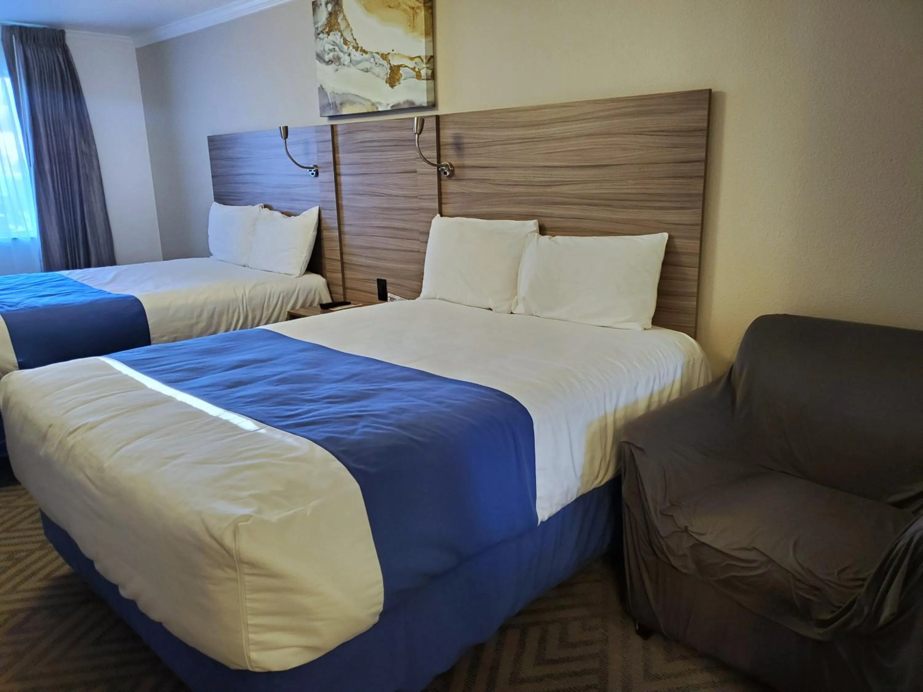 Bed in Exchange Club Motel