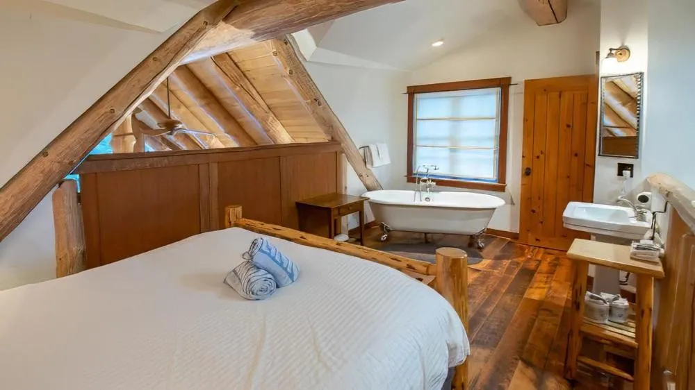 Bed in Snow Creek Cabins by Fernie Lodging Co