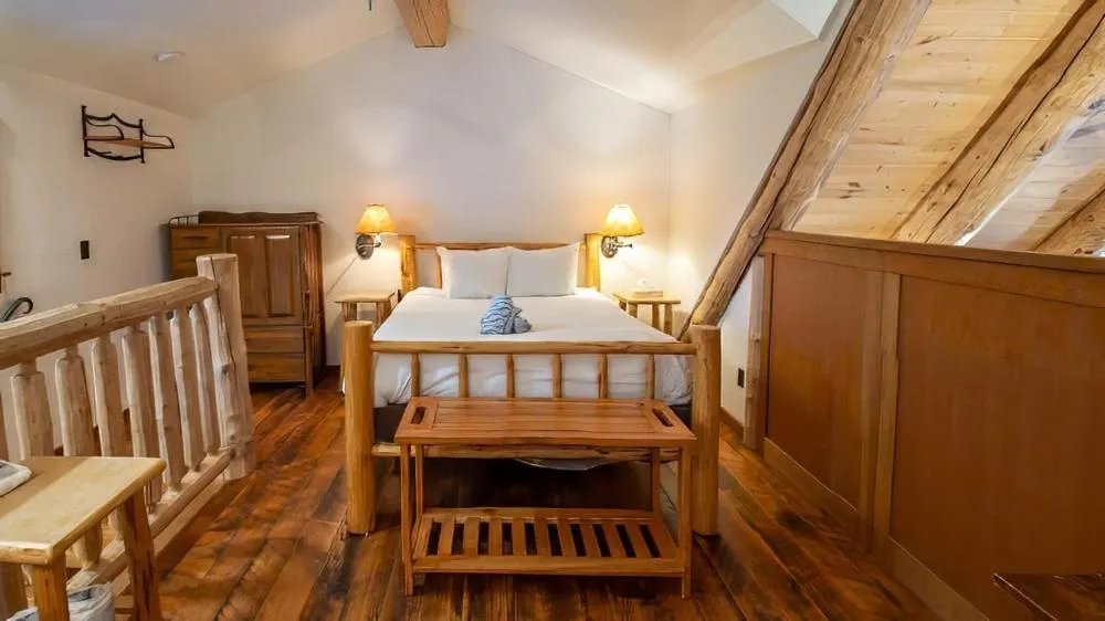 Bed in Snow Creek Cabins by Fernie Lodging Co