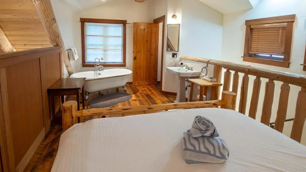 Bed in Snow Creek Cabins by Fernie Lodging Co