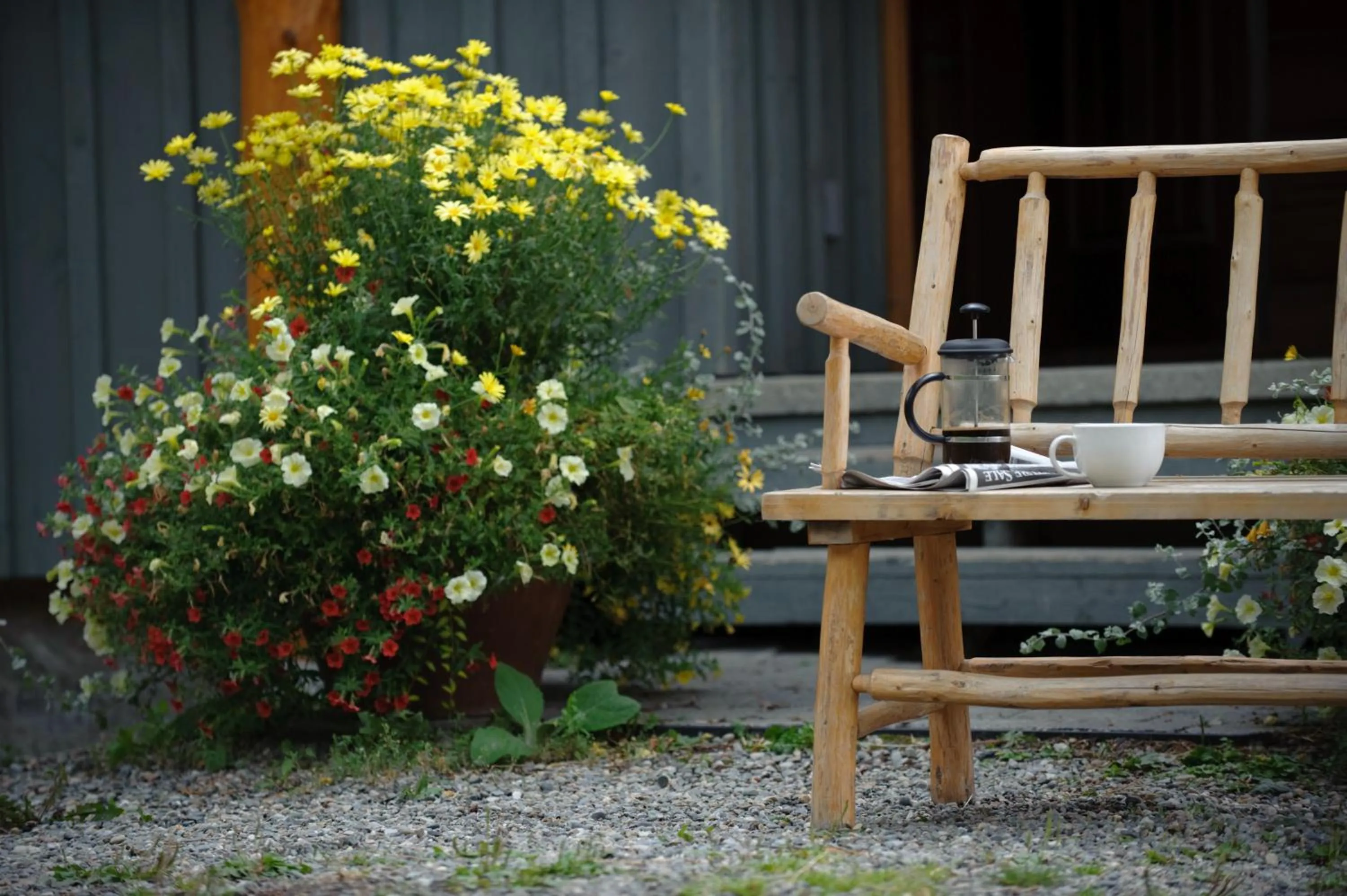 Seating area in Snow Creek Cabins by Fernie Lodging Co