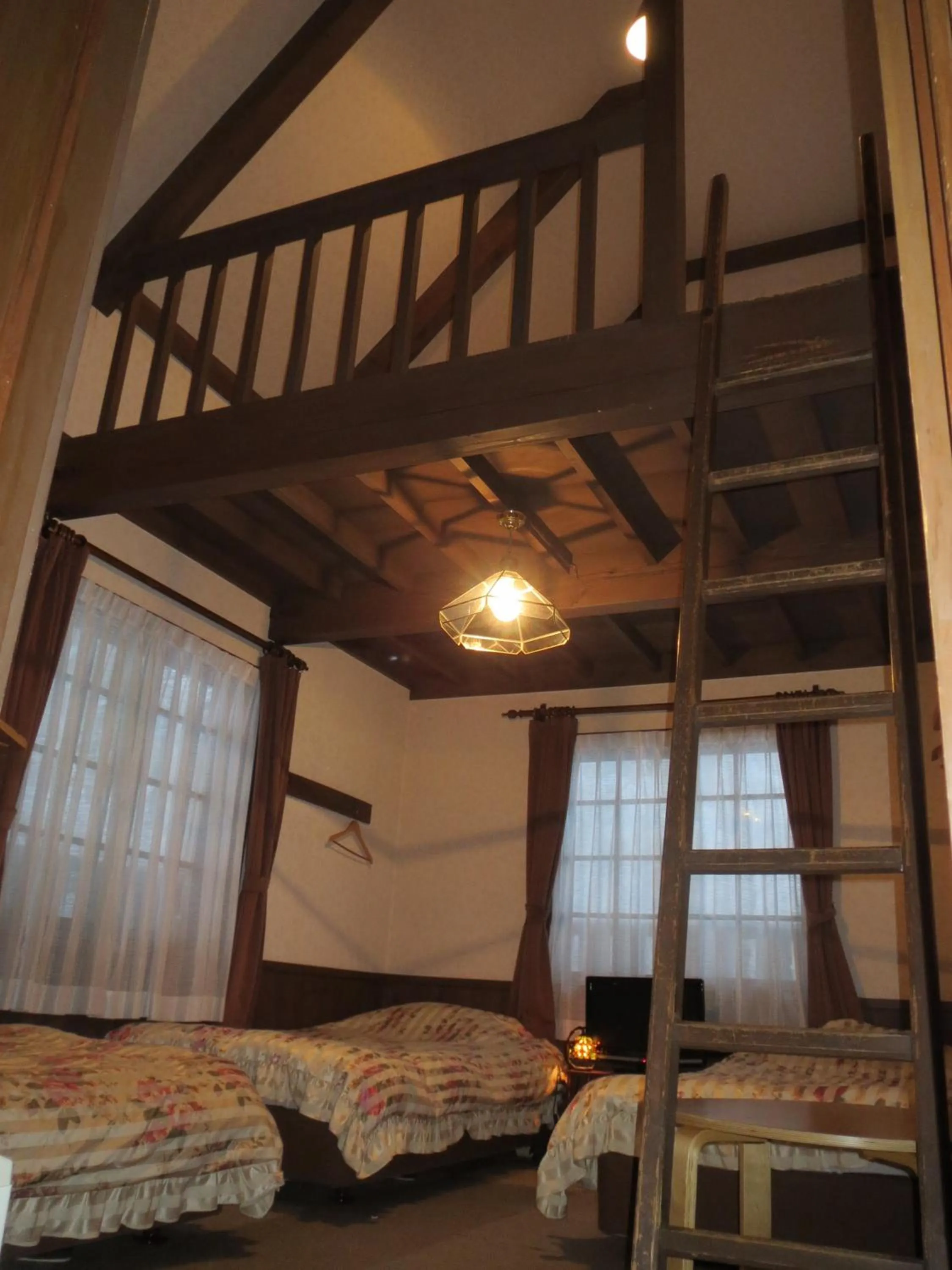 Photo of the whole room, Bed in Pension Marionette